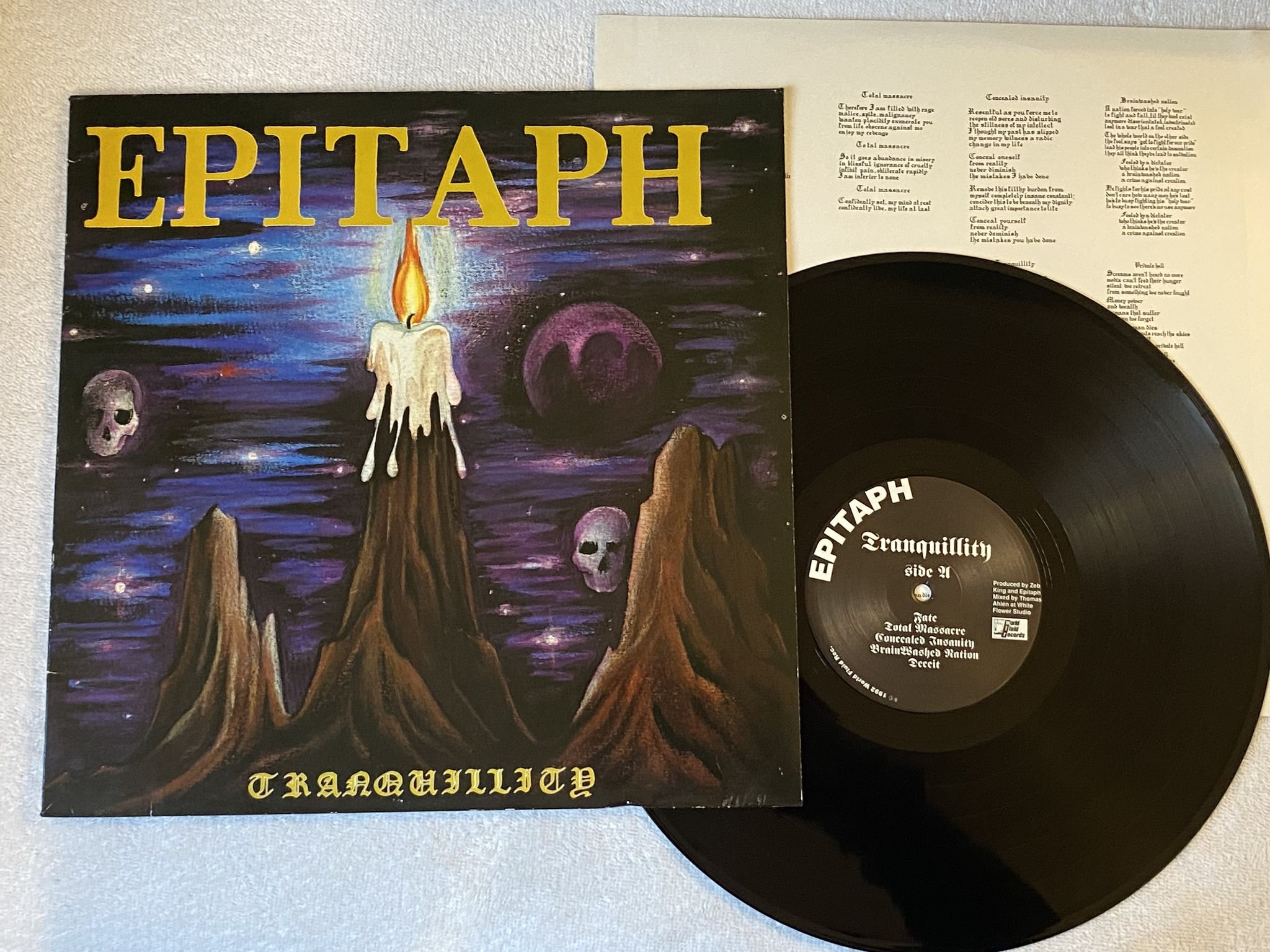 Omslagsbild för skivan EPITAPH Tranquillity LP -92 Swe WORLD FLUID WFR LP 03 *** TRASH METAL ***