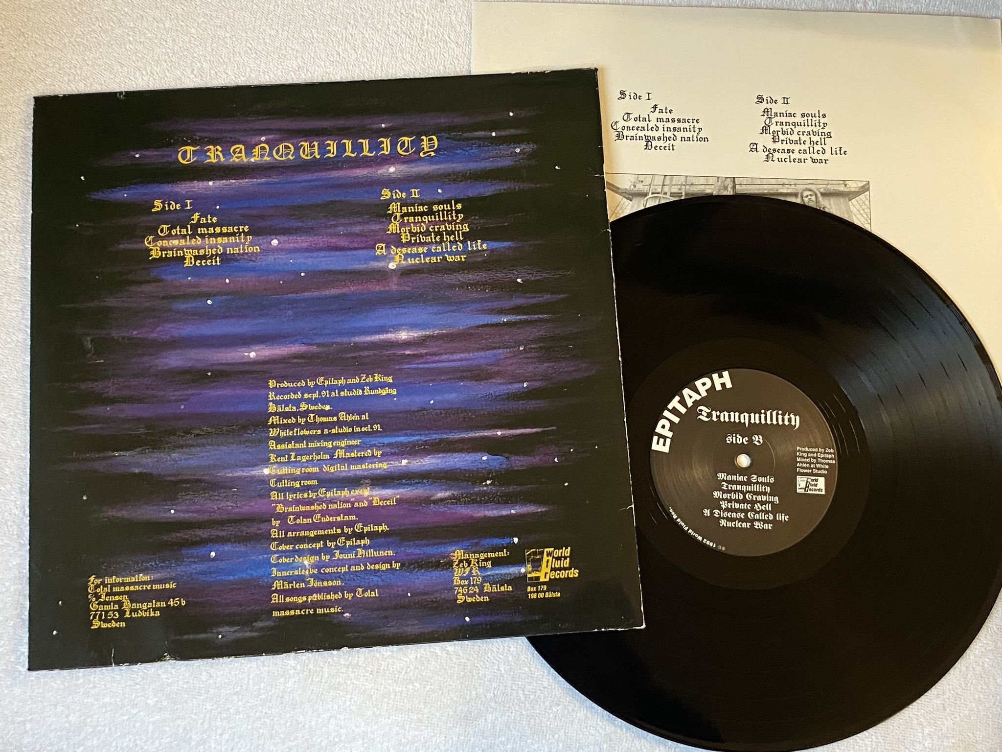 Omslagsbild för skivan EPITAPH Tranquillity LP -92 Swe WORLD FLUID WFR LP 03 *** TRASH METAL ***