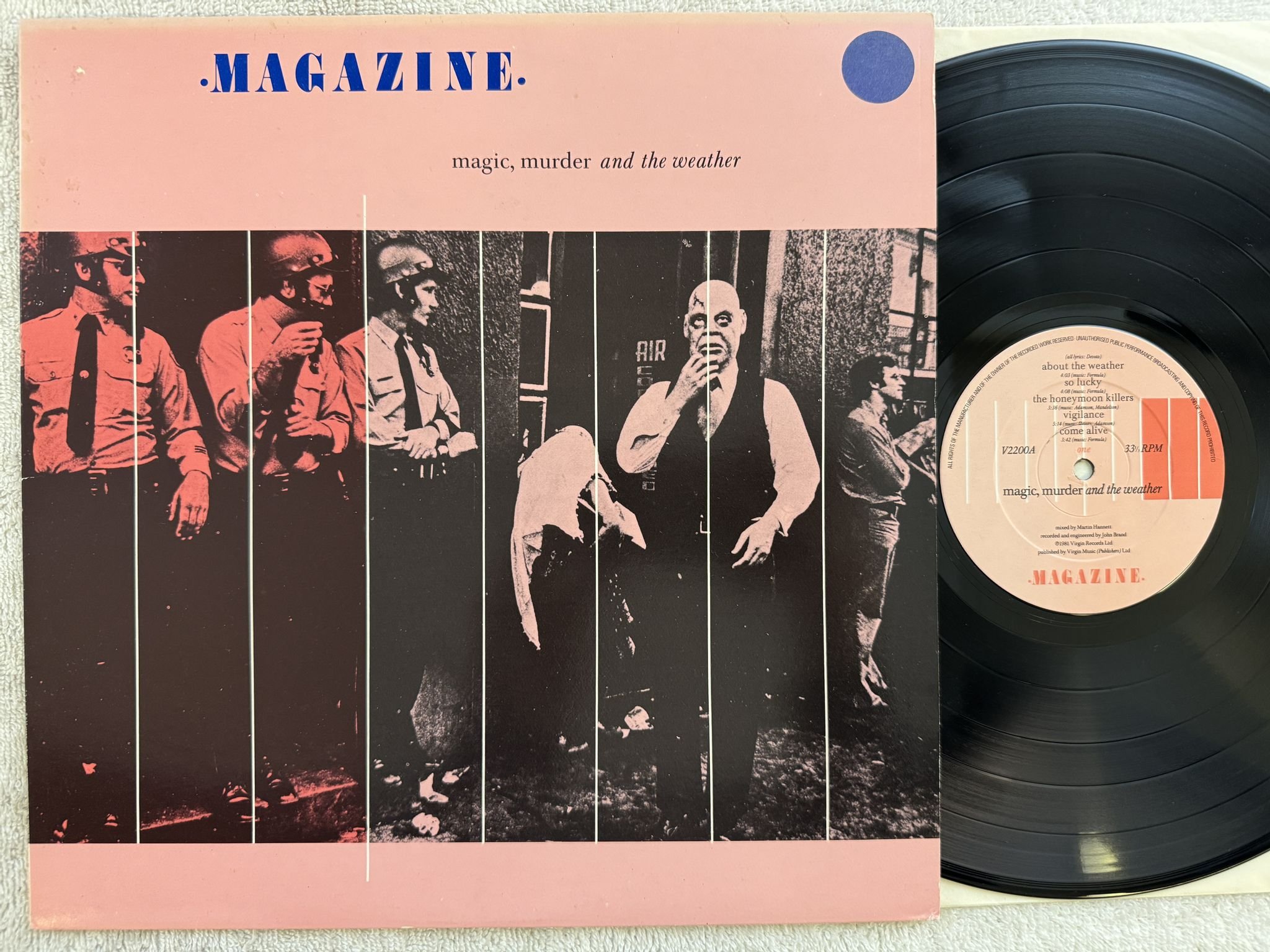 Omslagsbild för skivan MAGAZINE Magic, Murder And The Weather LP VIRGIN V2200 ** NEW WAVE **