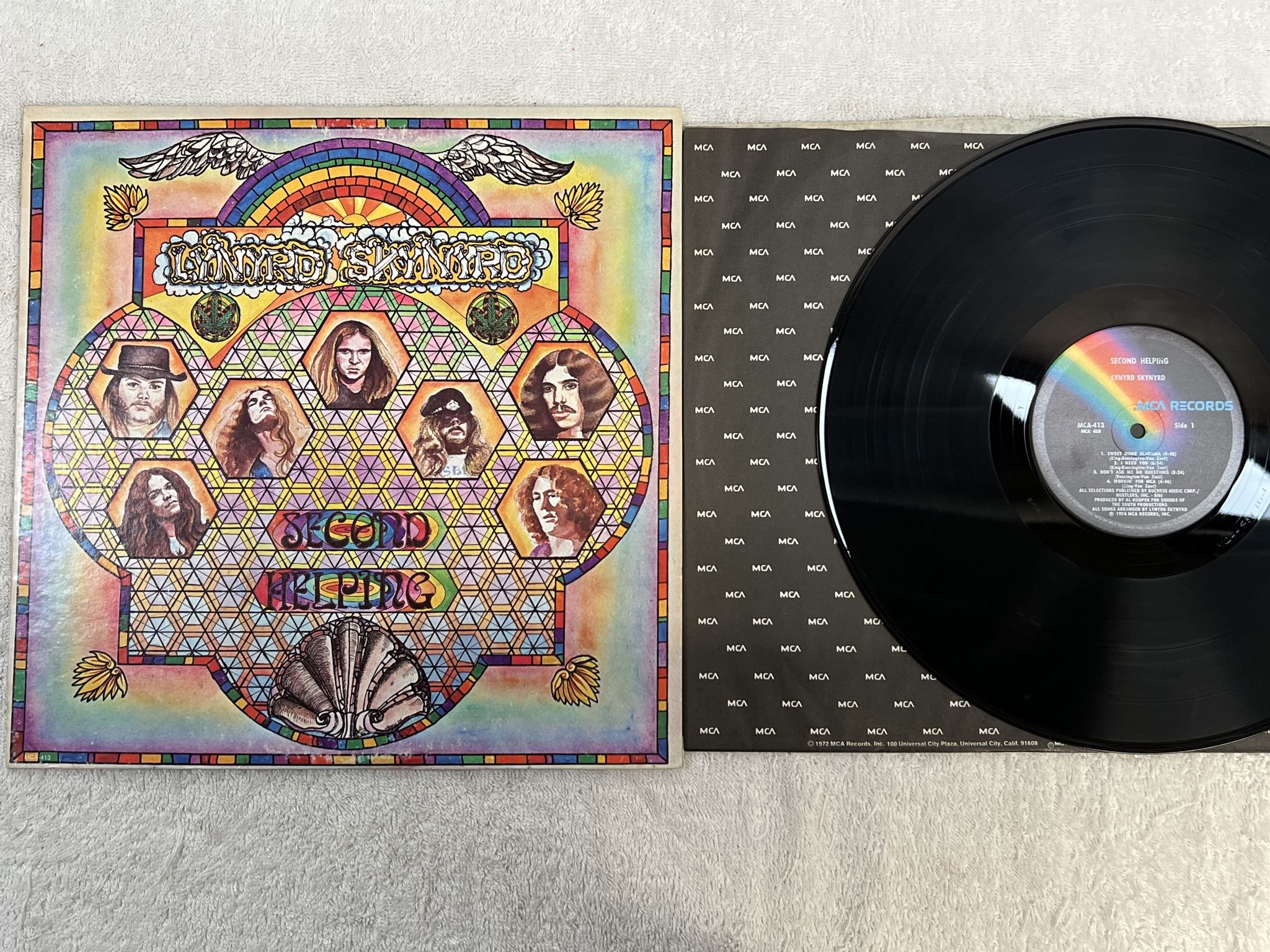 Omslagsbild för skivan LYNYRD SKYNYRD second helping LP -75 US MCA 413 *** Southern Rock ***
