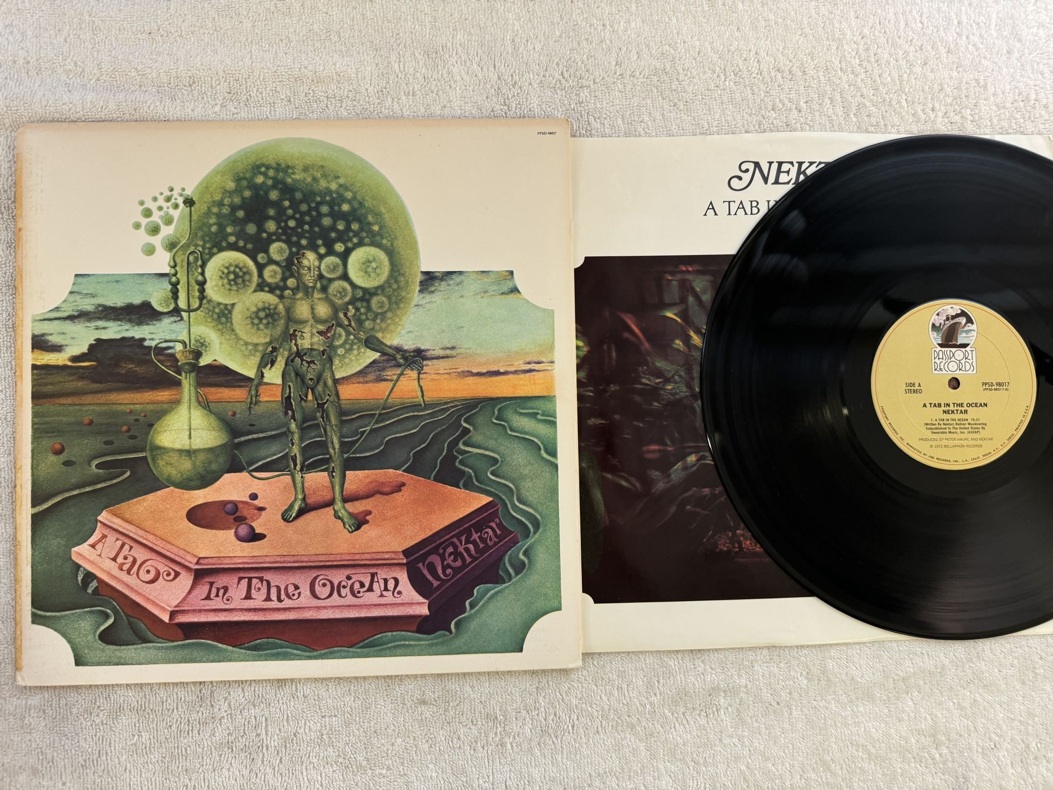 Omslagsbild för skivan NEKTAR a tab in the ocean LP US PASSPORT PPSD 98017