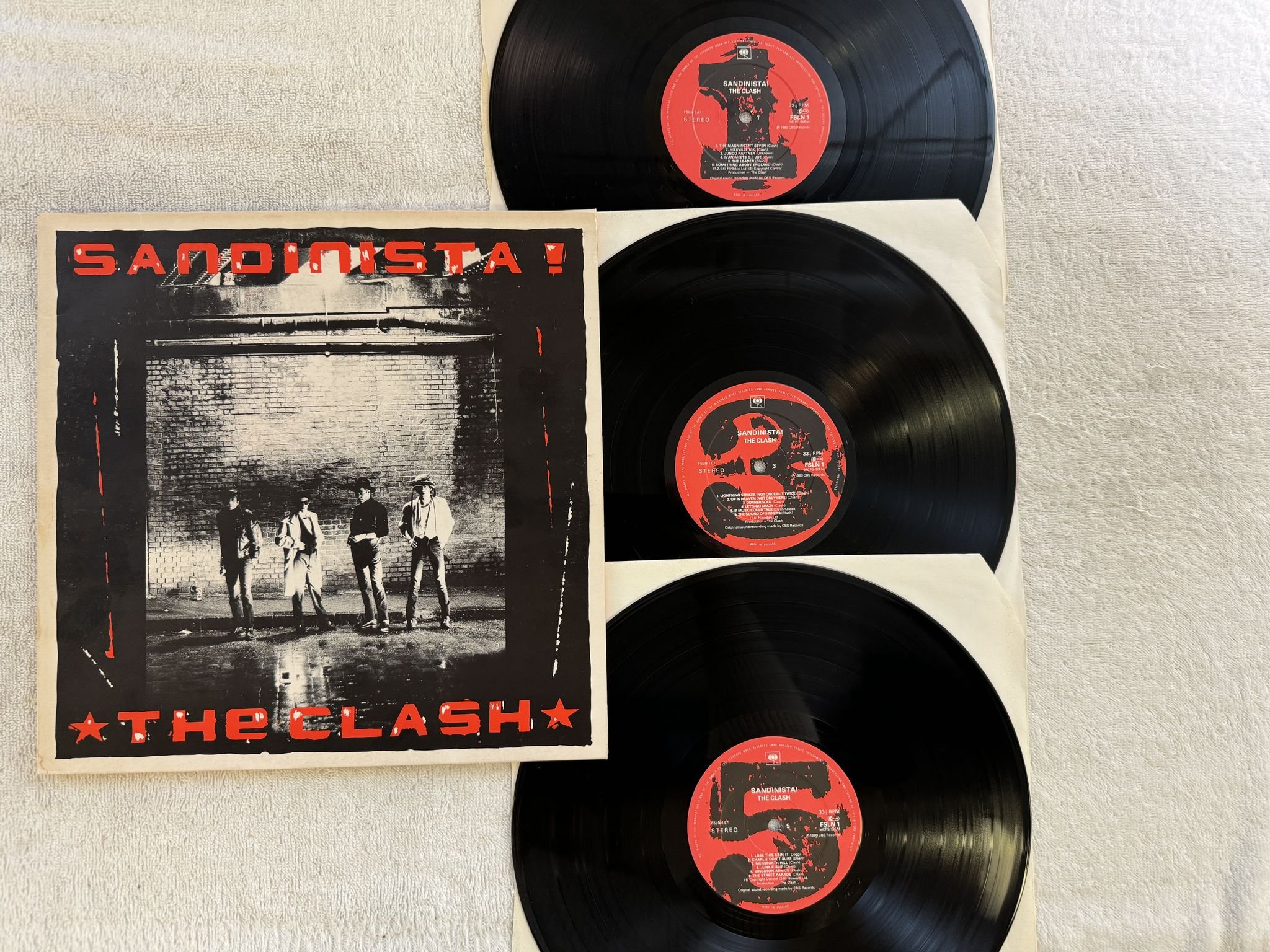 Omslagsbild för skivan THE CLASH sandinista! 3xLP -80 UK CBS FSLN 1