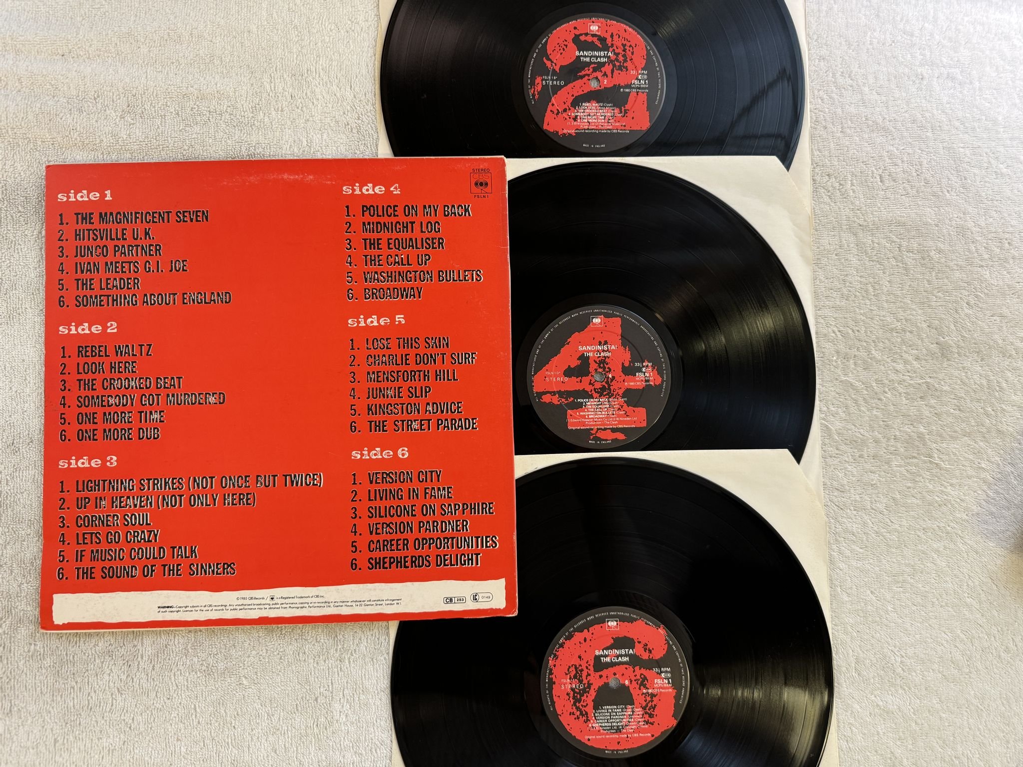 Omslagsbild för skivan THE CLASH sandinista! 3xLP -80 UK CBS FSLN 1