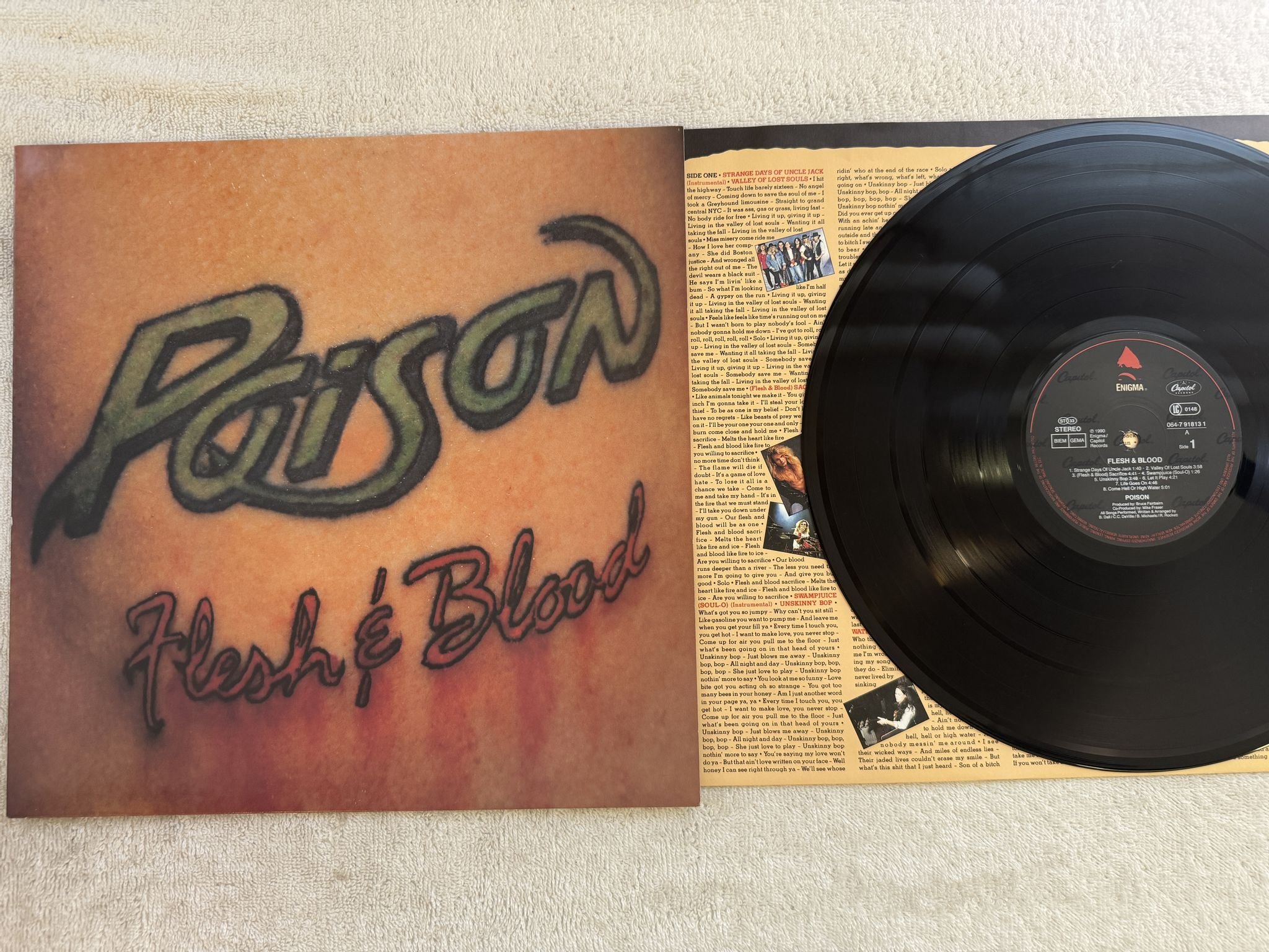 Omslagsbild för skivan POISON flesh & blood LP -90 Ger ENIGMA 064-7918131