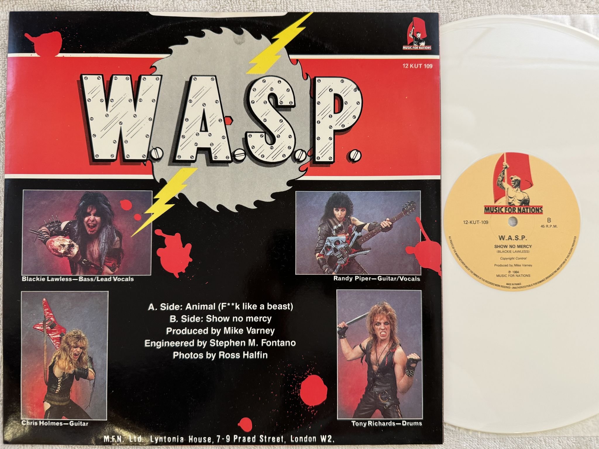 Omslagsbild för skivan W.A.S.P. animal 12" -84 UK MUSIC FOR NATION 12 KUT 109 *** WHITE VINYL ***