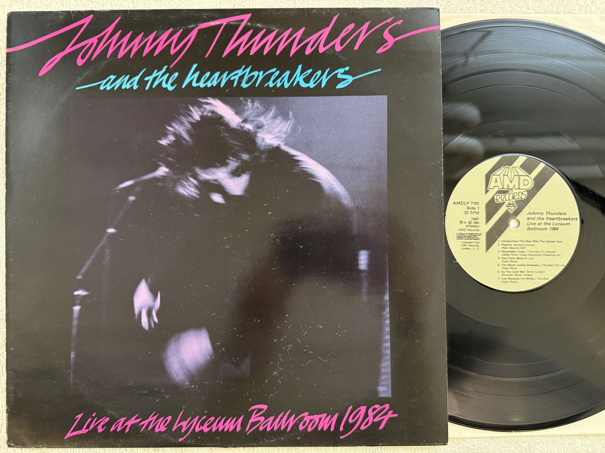 Omslagsbild för skivan JOHNNY THUNDER & THE HEARTBREAKERS live , 1984 LP UK WMD AMDLP 7101