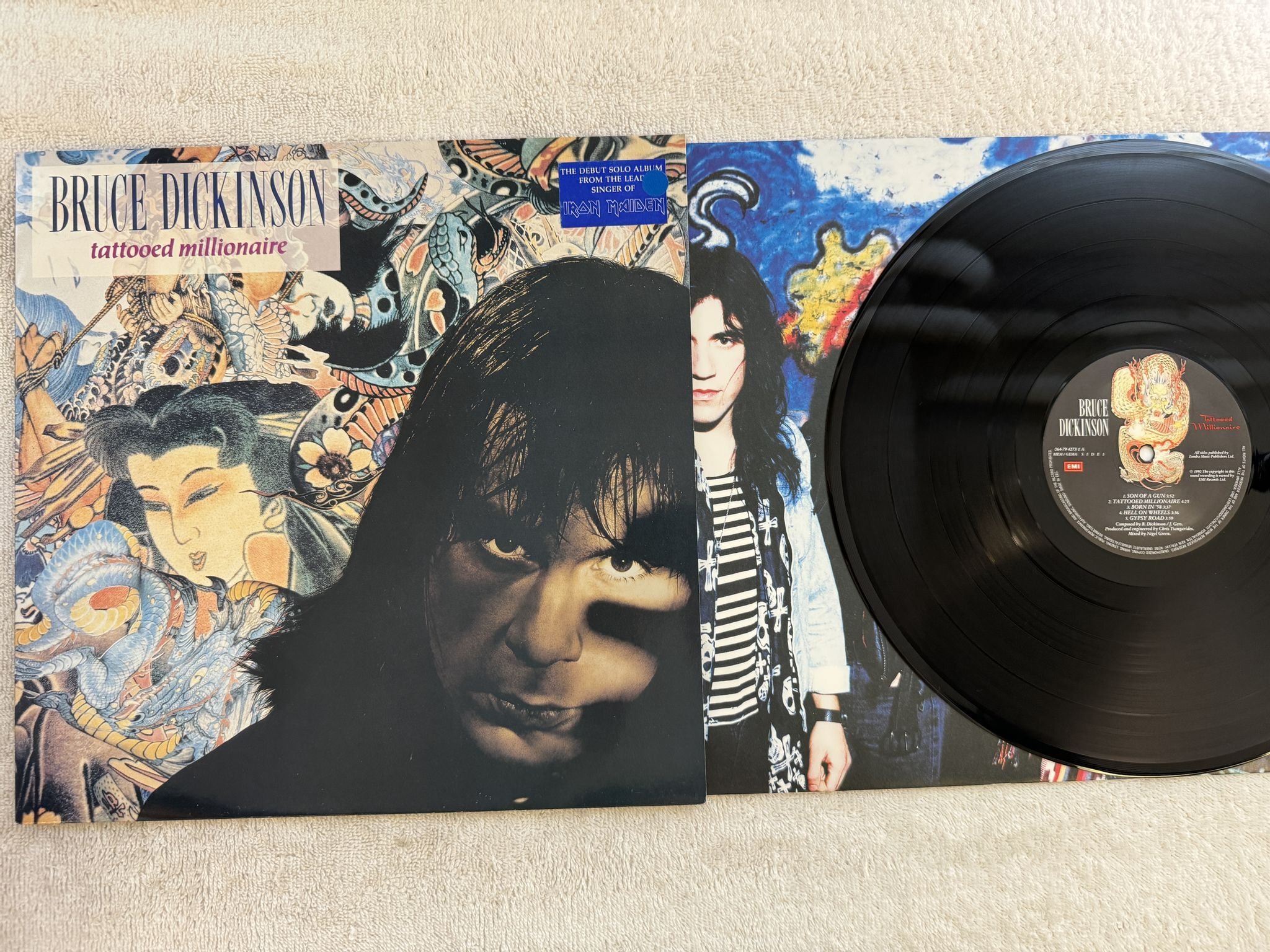 Omslagsbild för skivan BRUCE DICKINSON Tattooed Millionaire LP -90 EEC EMI 064-794273 1