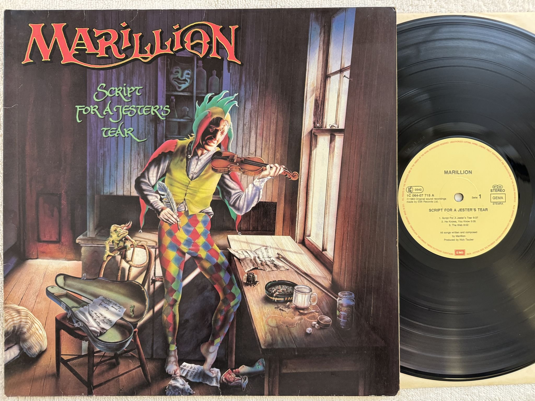 Omslagsbild för skivan MARILLION script for a jester's tear LP -83 EMI 1C 064-07715