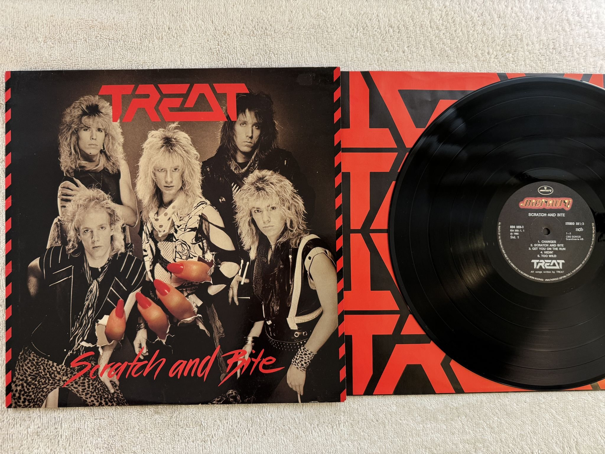 Omslagsbild för skivan TREAT scratch and bite LP -85 ncb MERCURY 824 353-1 *** Poster ***