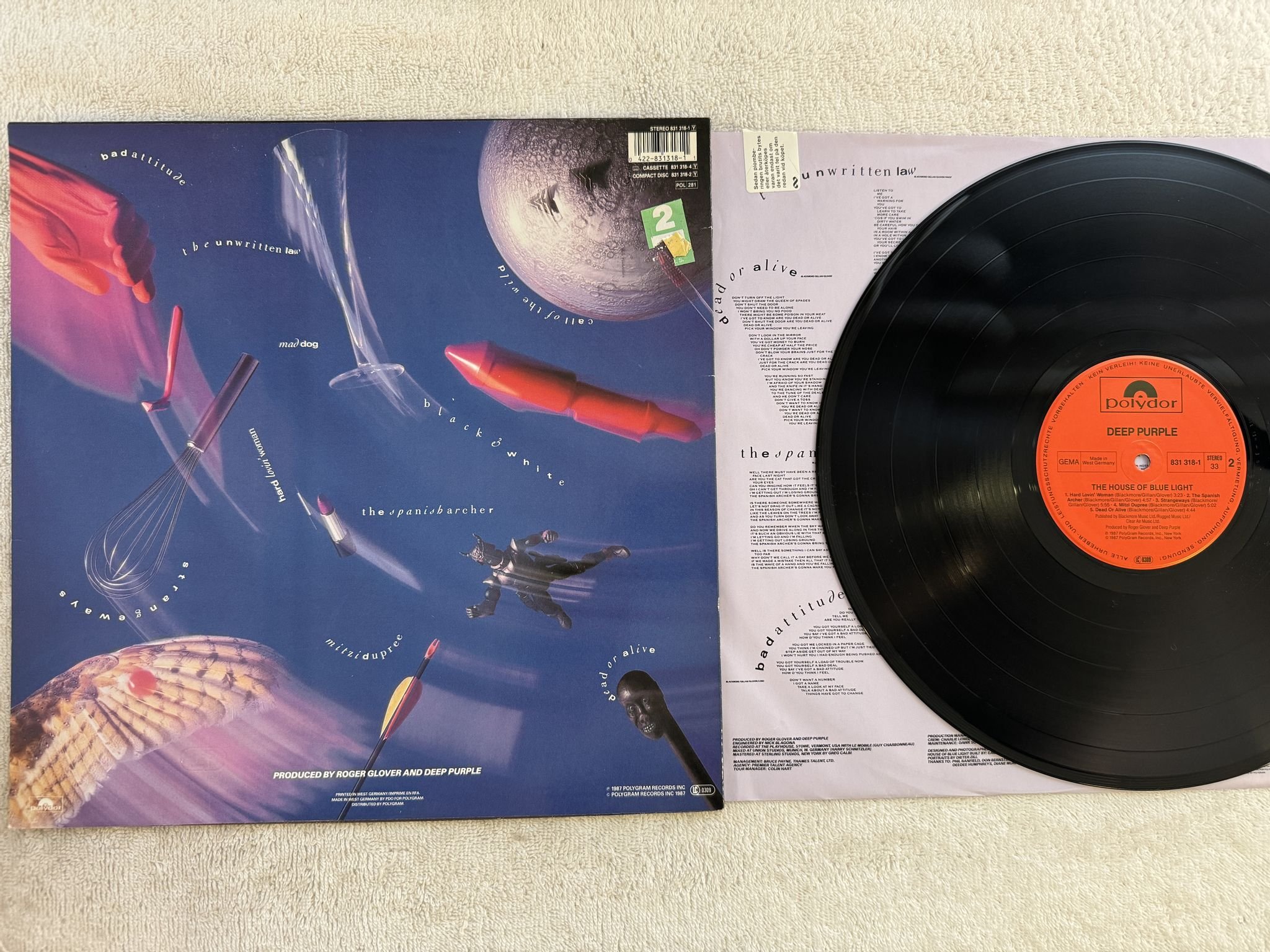 Omslagsbild för skivan DEEP PURPLE the house of blue light LP -87 Ger POLYDOR 831 318-1