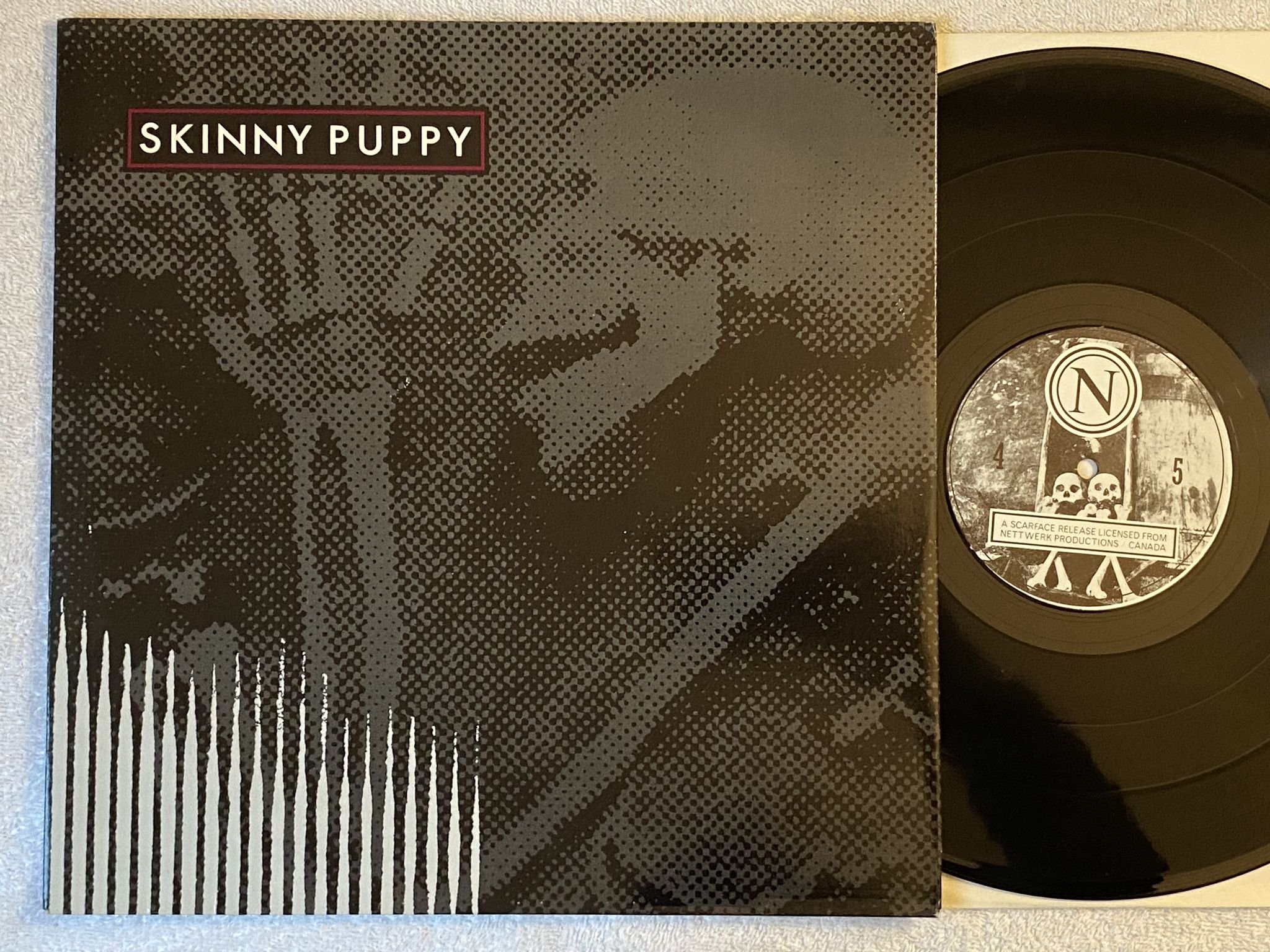 Omslagsbild för skivan SKINNY PUPPY Remission LP -84 Belgium SCARFACE M face 10