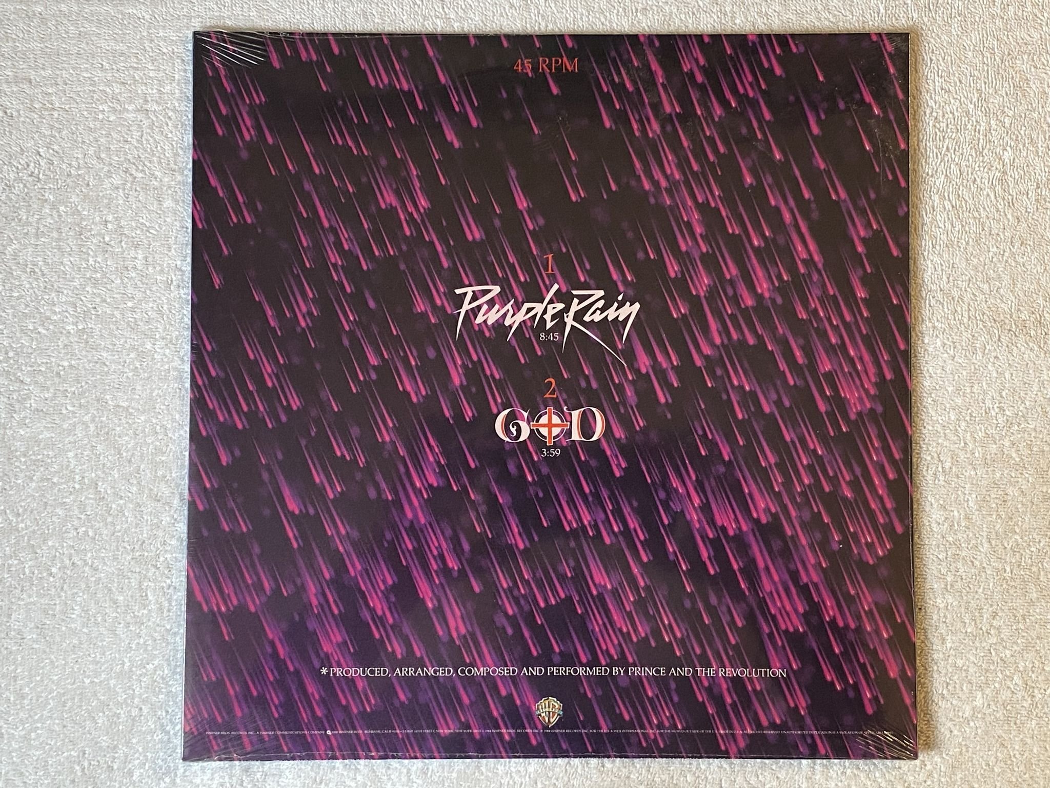 Omslagsbild för skivan PRINCE & THE REVOLUTION Purple Rain 12" -84 US WARNER * PURPLE VINYL / SEALED *