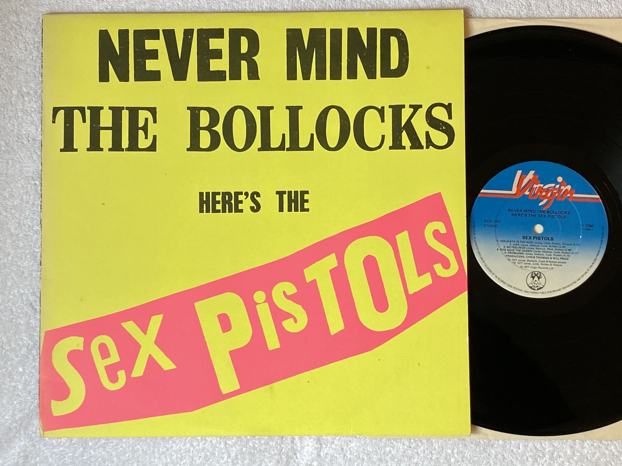 Omslagsbild för skivan SEX PISTOLS Never Mind The Bollocks Here's The LP -77 UK v2086 *** 11 track ***