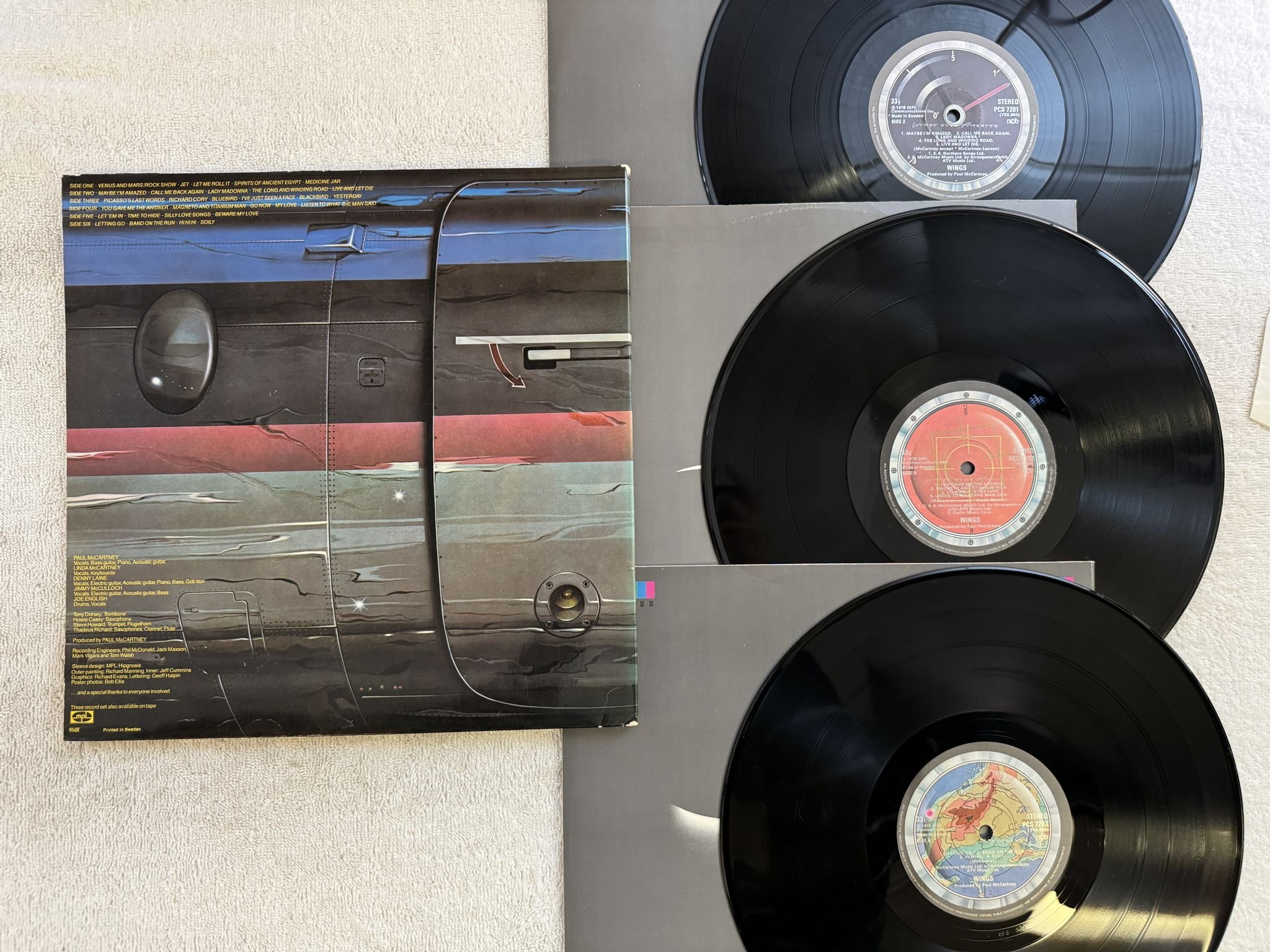 Omslagsbild för skivan WINGS OVER AMERICA 3xLP -76 Swe MPL 7C 154-98497/8/9