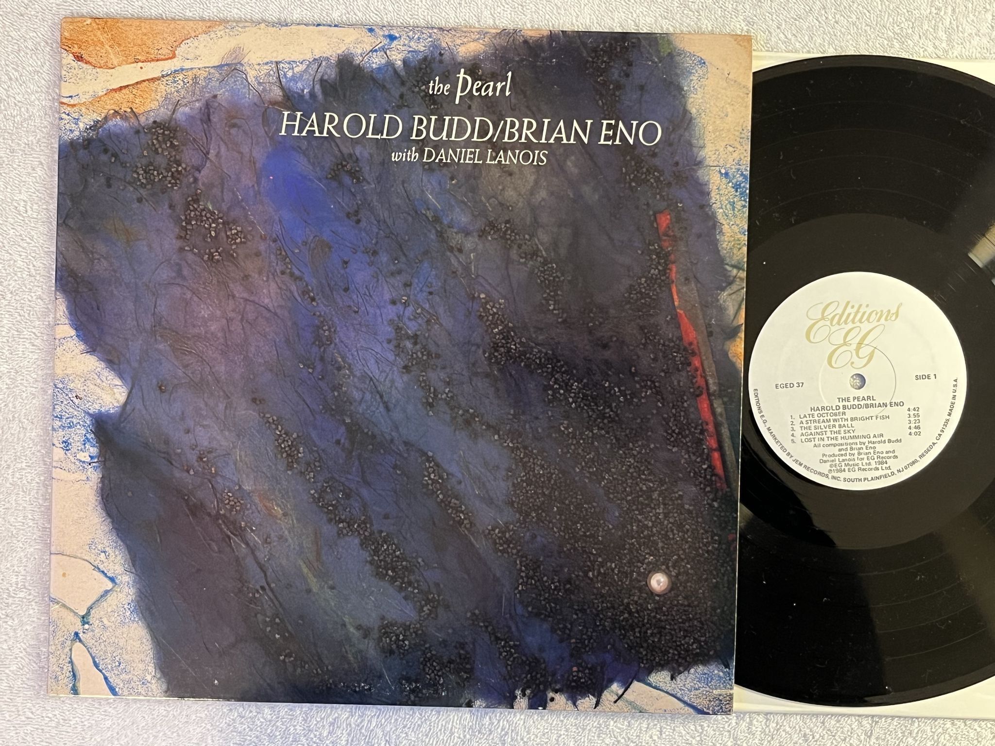 Omslagsbild för skivan HAROLD BUDD / BRIAN ENO the pearl LP -84 US EDITIONS EG EGED 37