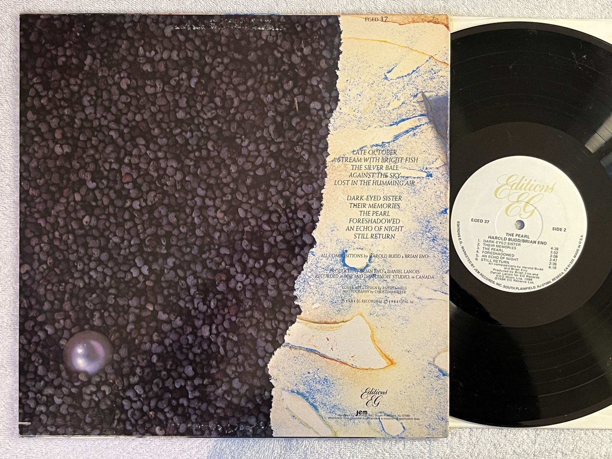 Omslagsbild för skivan HAROLD BUDD / BRIAN ENO the pearl LP -84 US EDITIONS EG EGED 37