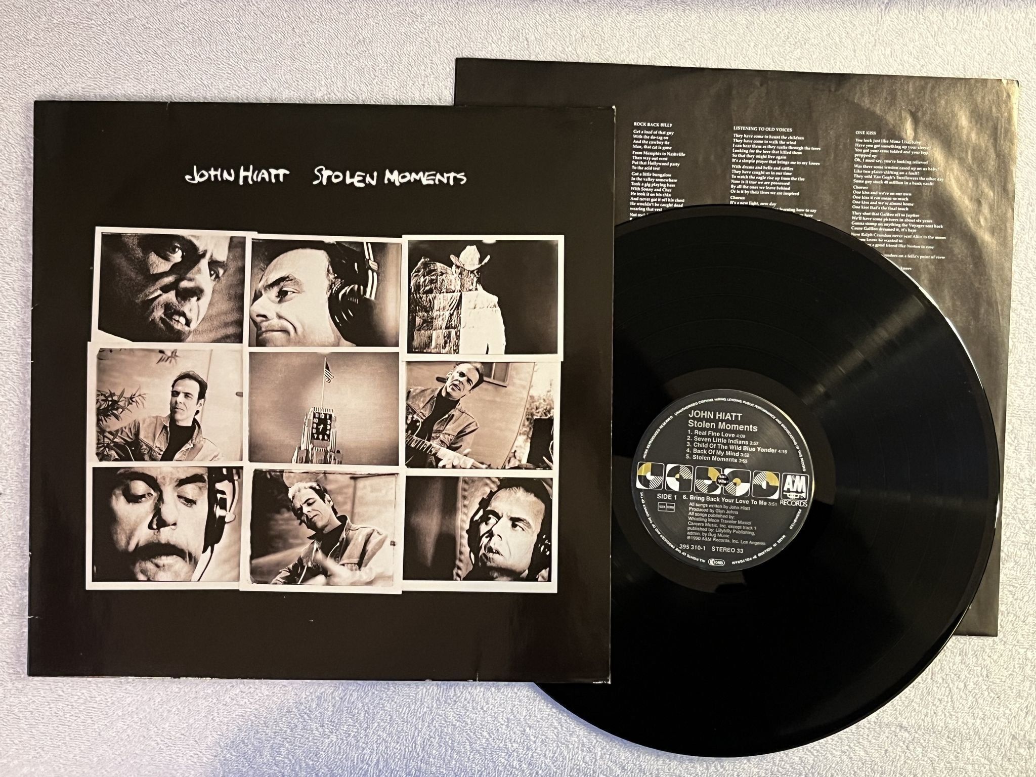 Omslagsbild för skivan JOHN HIATT Stolen Moments LP -90 A&M 395 310-1