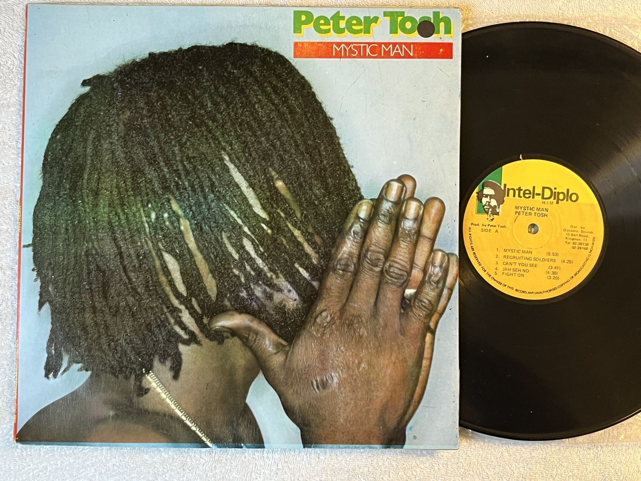 Omslagsbild för skivan PETER TOSH mystic man LP Jamaica INTEL-DIPLO