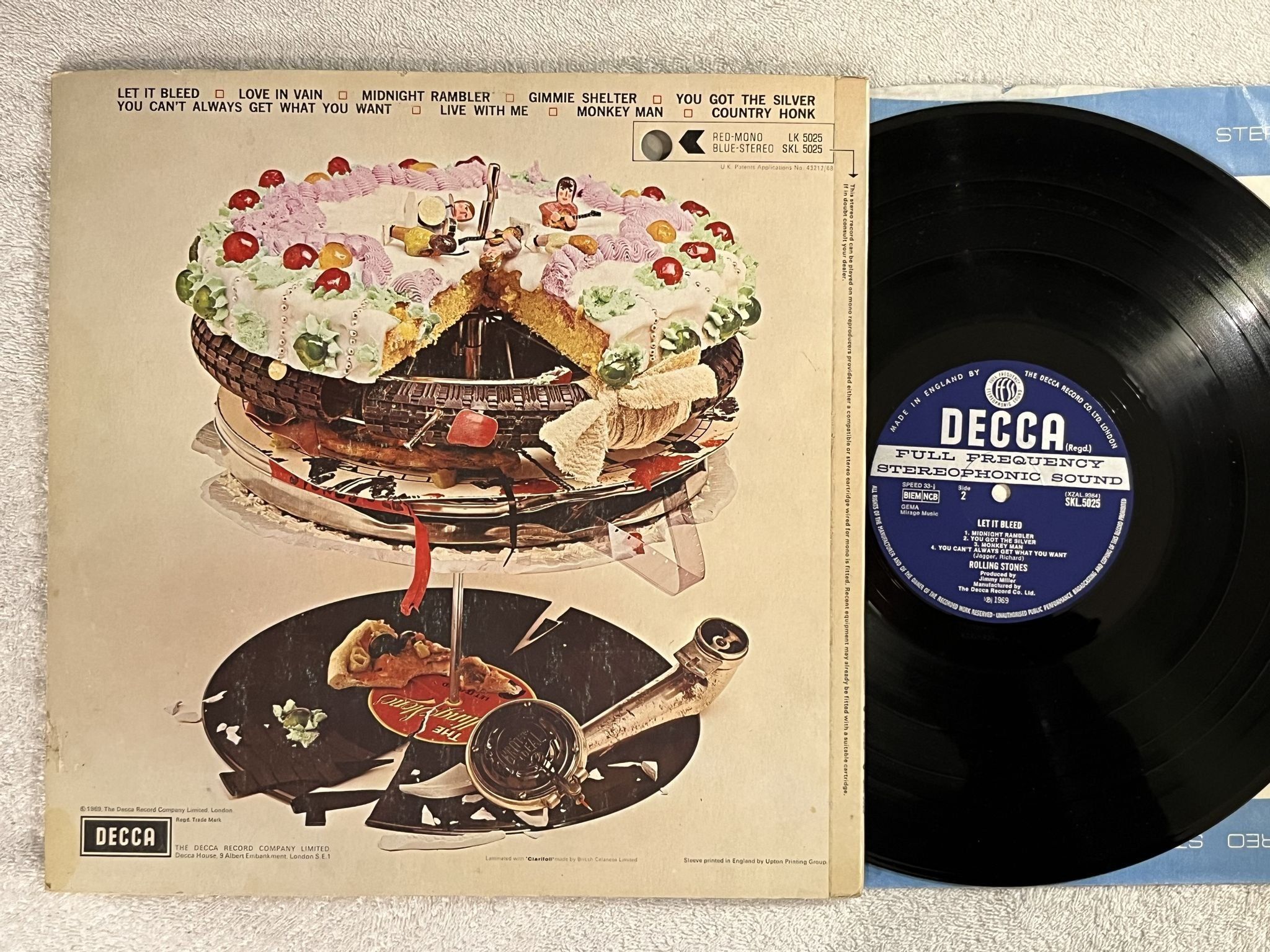 Omslagsbild för skivan THE ROLLING STONES let it bleed LP -69 UK DECCA SKL 5025 *** POSTER ***