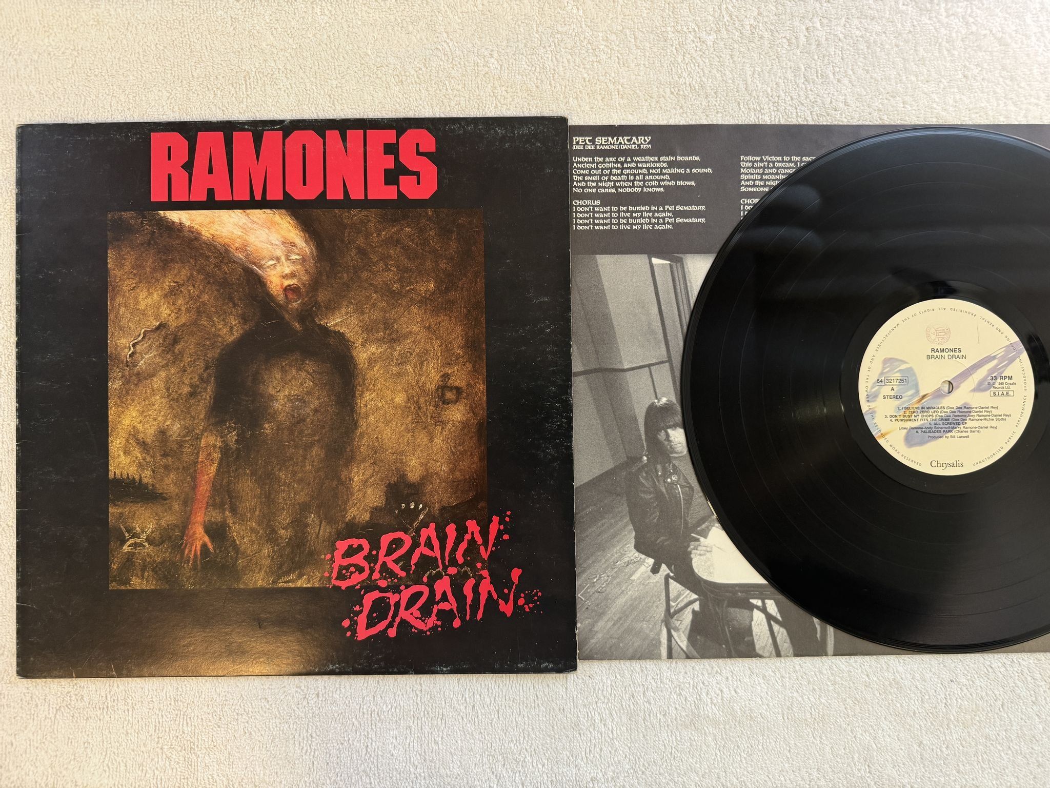 Omslagsbild för skivan RAMONES brain drain LP -89 Ita CHRYSALIS 64 3217251