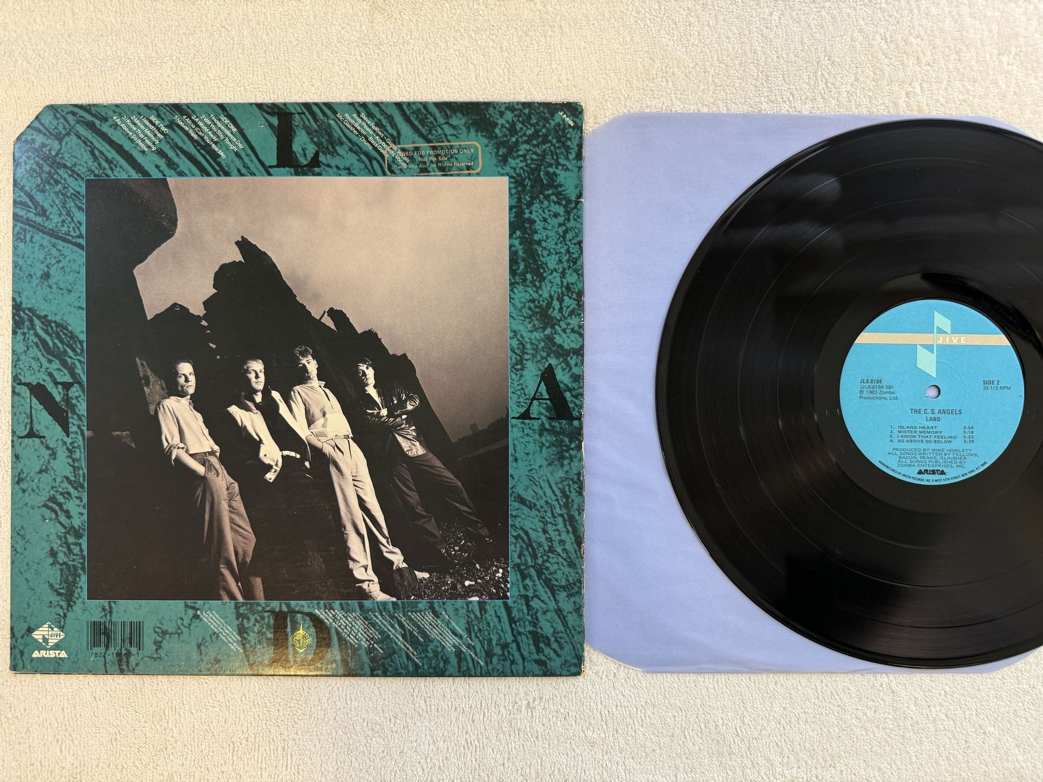 Omslagsbild för skivan THE COMSAT ANGELS Land LP -83 US JIVE JL8-8184