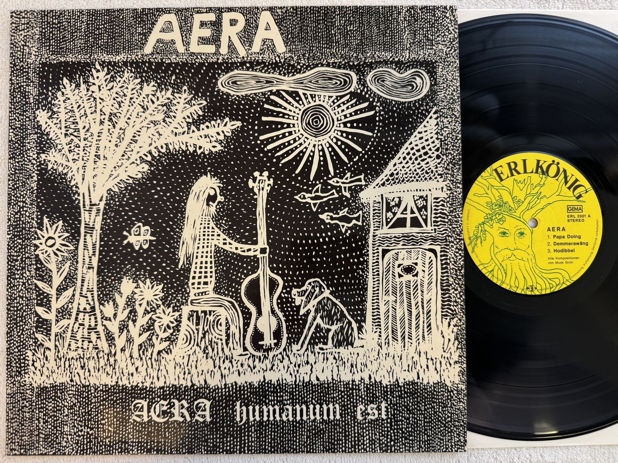 Omslagsbild för skivan AERA Aera Humanum Est LP -75 Ger Erlkönig Sch. ERL 2001 ** JAZZ-ROCK **