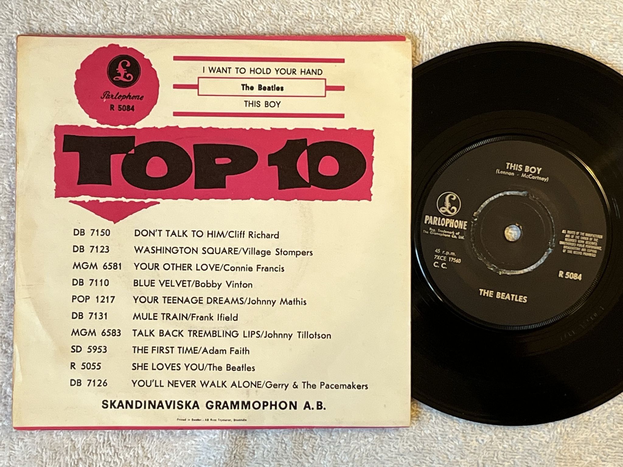 Omslagsbild för skivan THE BEATLES I want to hold your hand 7" parlophone R 5084 *** Rare Pink Cover **
