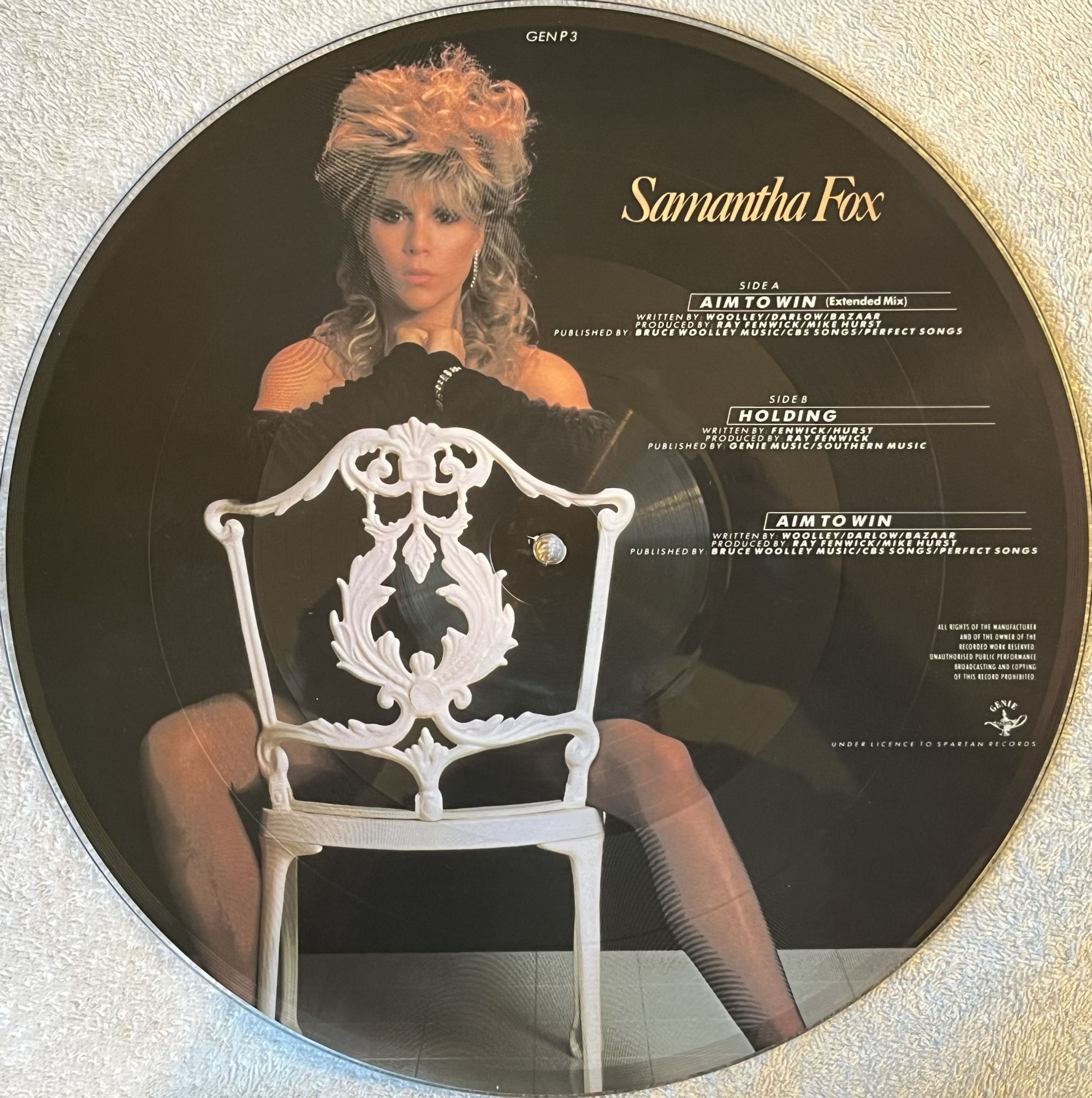 Omslagsbild för skivan SAMANTHA FOX Aim To Win 12" -86 UK GENIE GEN P 3