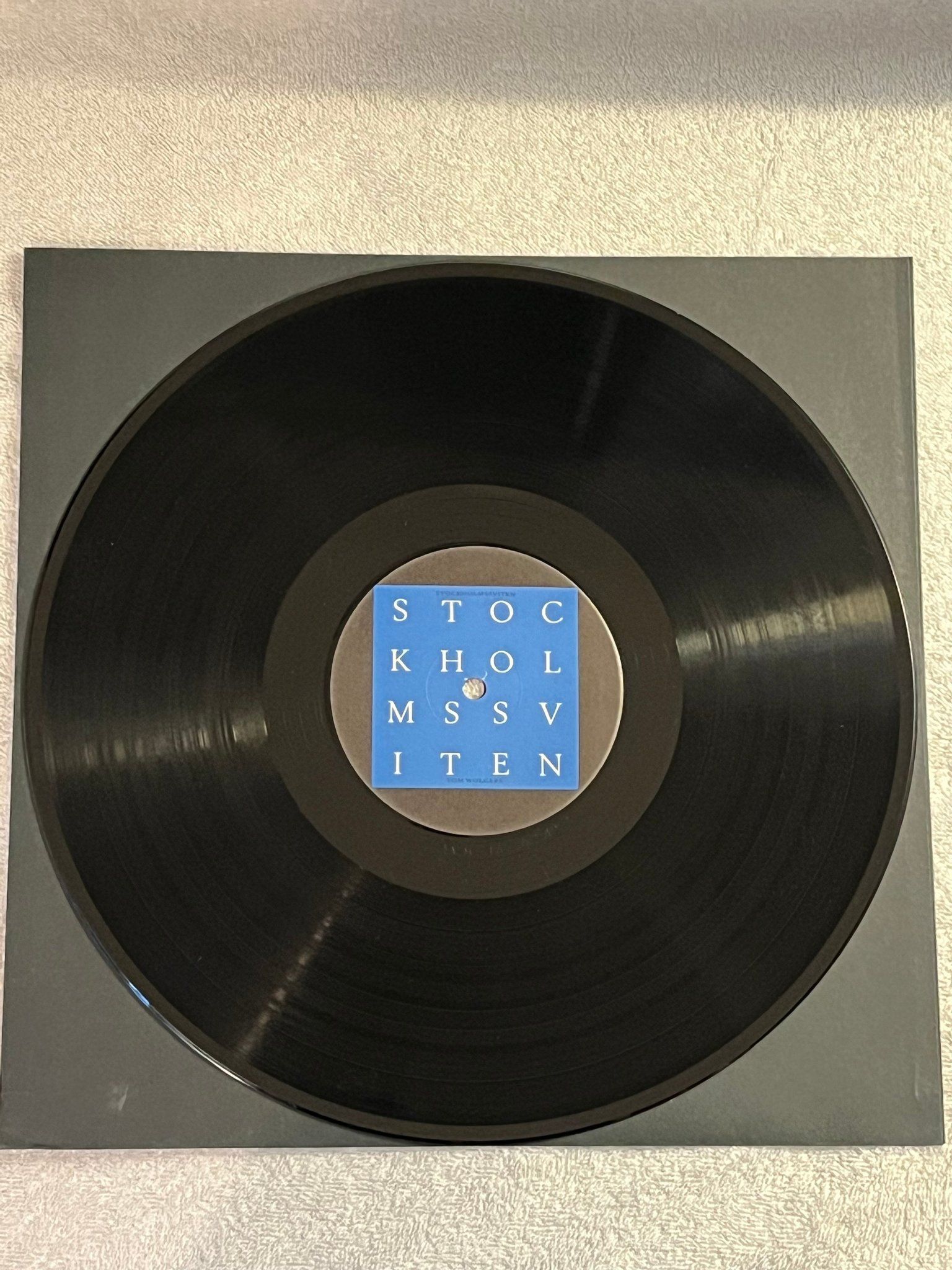 Omslagsbild för skivan TOM WOLGERS Stockholmssviten 12" -87 Swe IVM 16 + Book