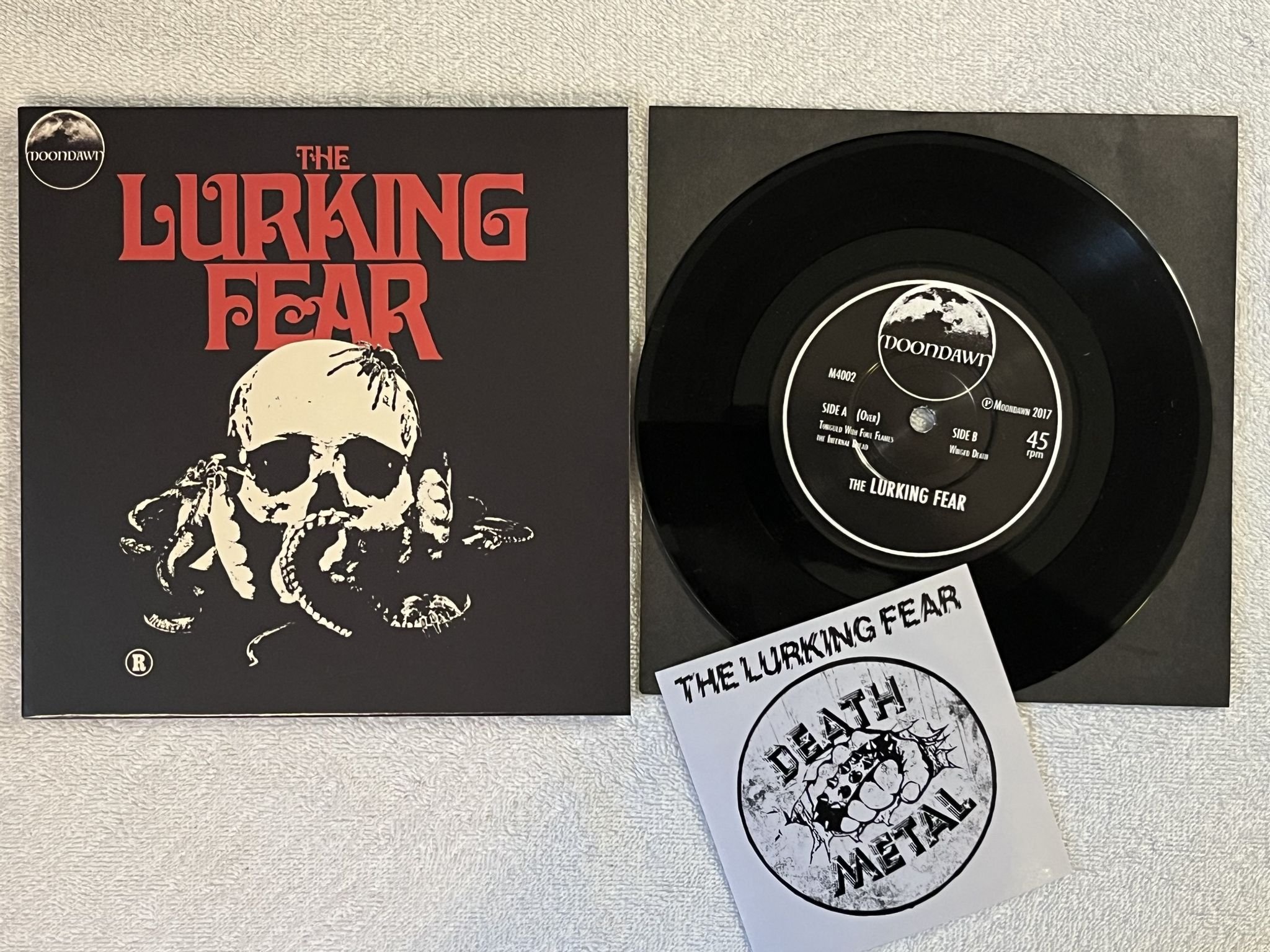 Omslagsbild för skivan THE LURKING FEAR s/t 7" 2017 Swe MOONDAWN M4002 ** DEATH METAL **