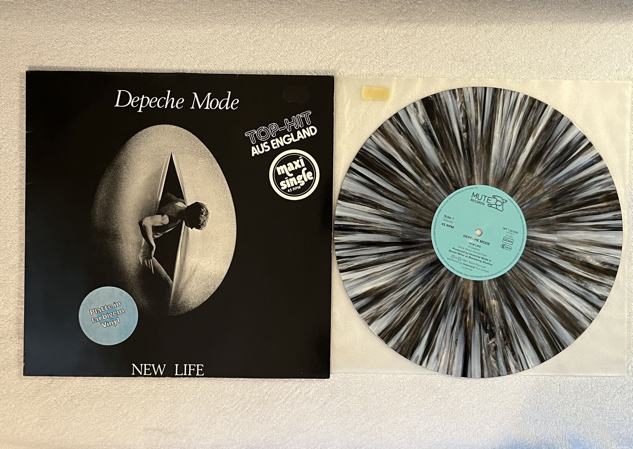 Omslagsbild för skivan DEPECHE MODE New Life 12" -87 Ger MUTE INT 126.800 ** Grey Marbled **