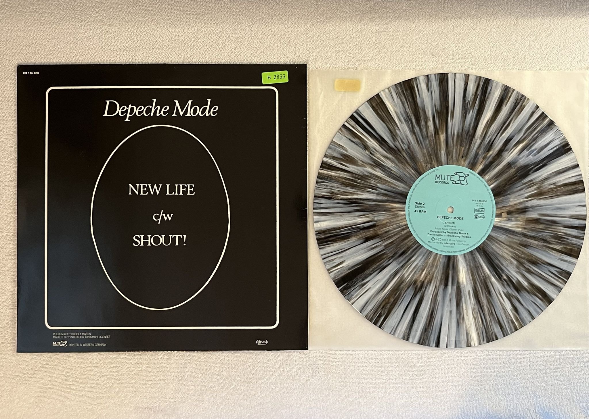 Omslagsbild för skivan DEPECHE MODE New Life 12" -87 Ger MUTE INT 126.800 ** Grey Marbled **