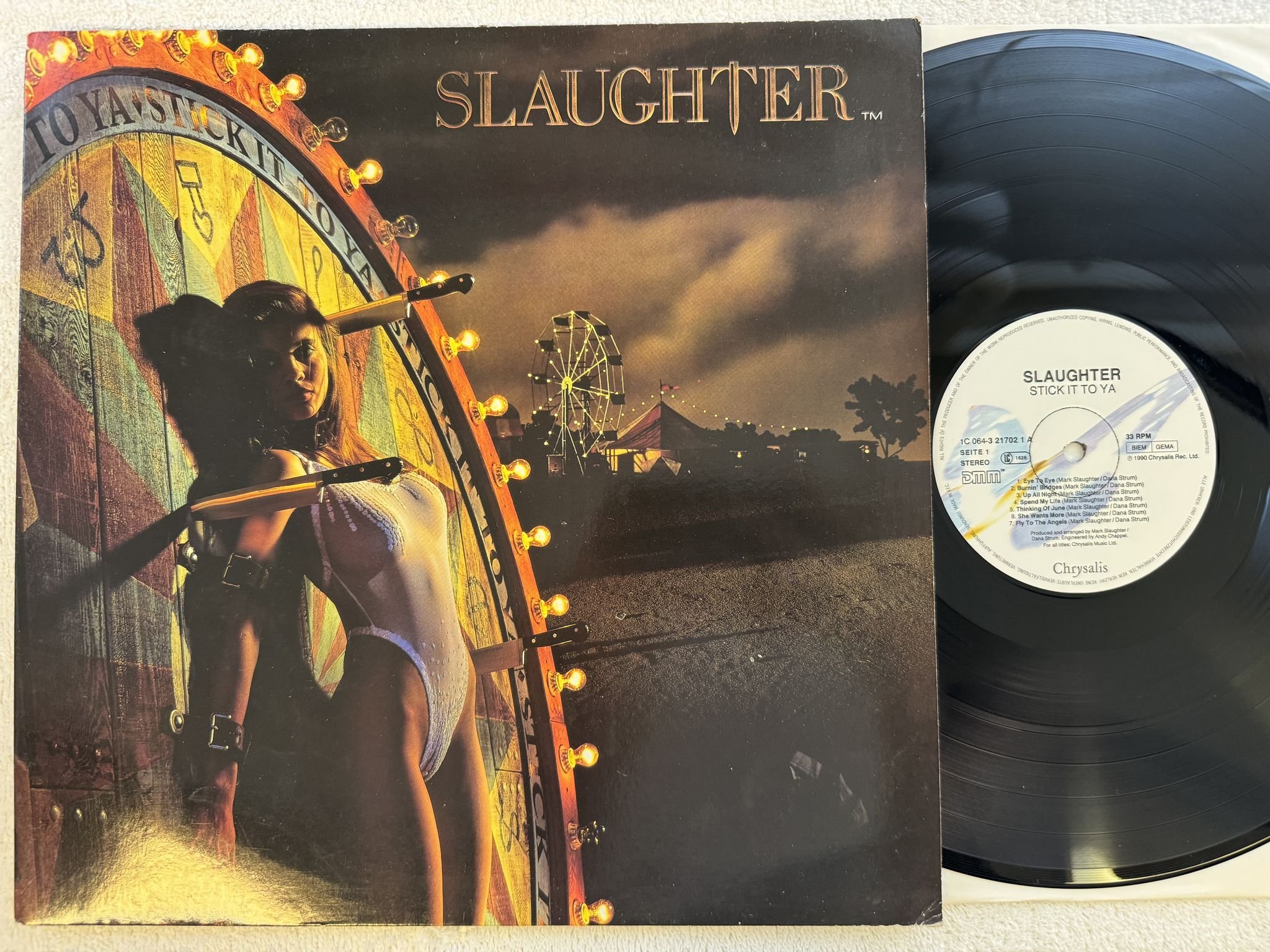 Omslagsbild för skivan SLAUGHTER stick it to ya LP -90 CHRYSALIS 1C 064-3 21702 1