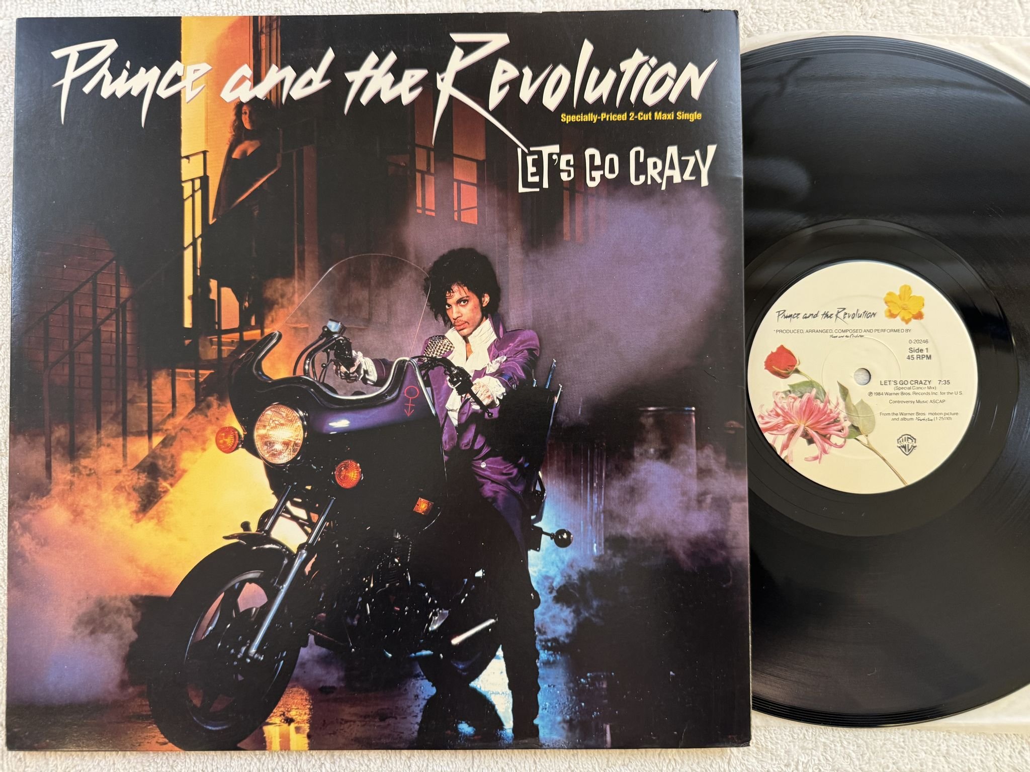 Omslagsbild för skivan PRINCE AND THE REVOLUTION let's go crazy 12" -84 US WARNER BROS 0-20246