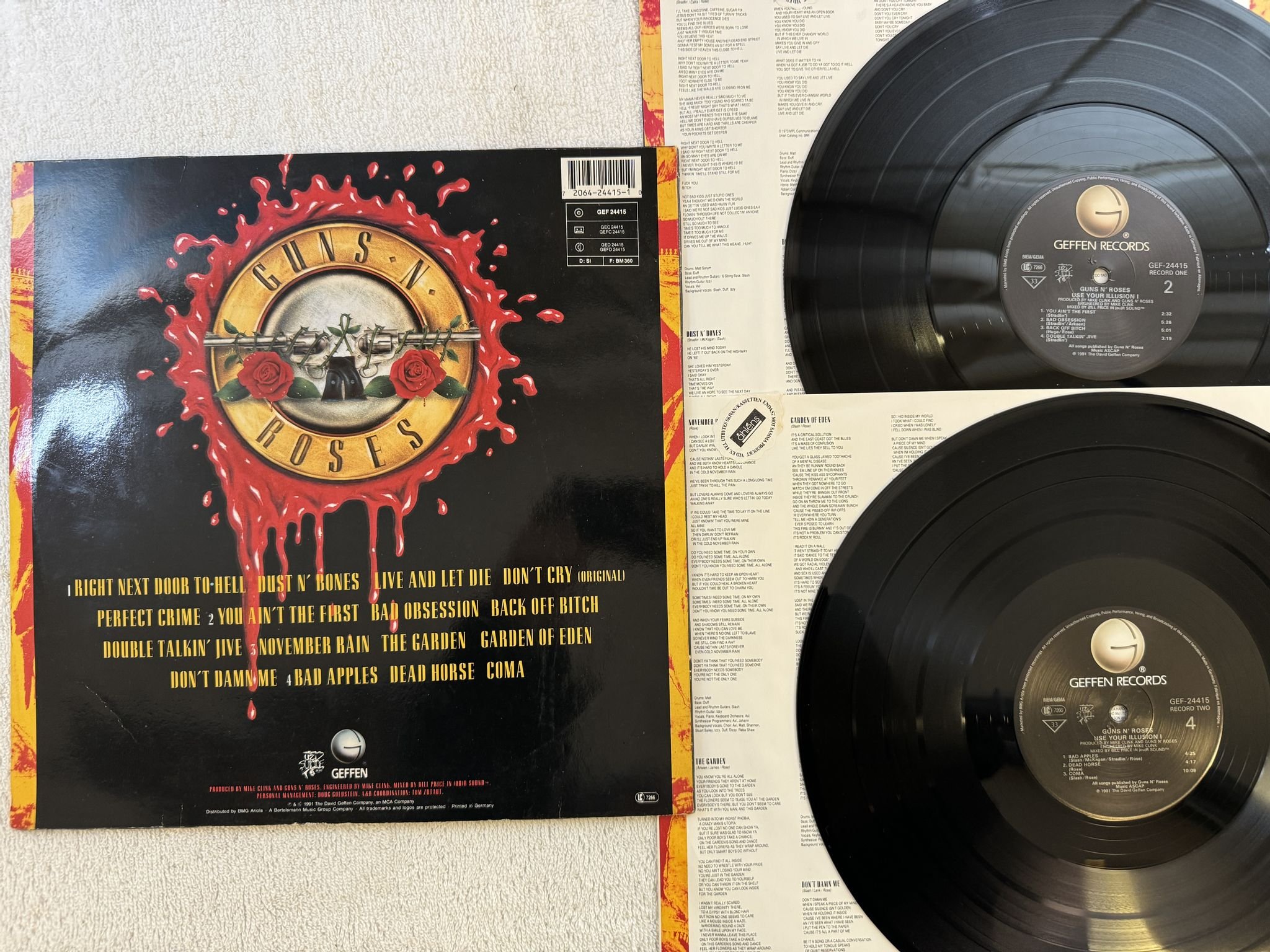 Omslagsbild för skivan GUNS N ROSES use your illusion I LP -91 Ger GEFFEN GEF 24415 *** CLASSIC ***