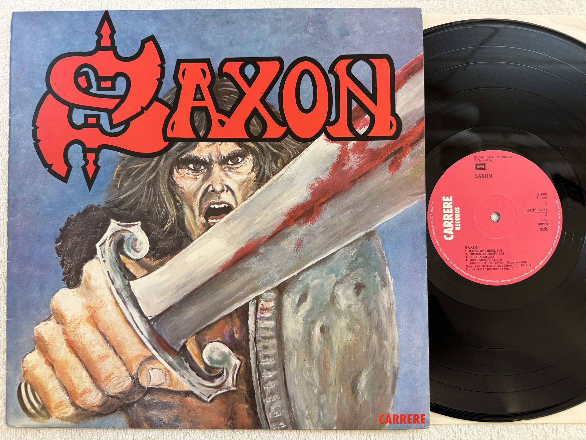 Omslagsbild för skivan SAXON s/t LP -79 ncb CARRERE CARS 67331