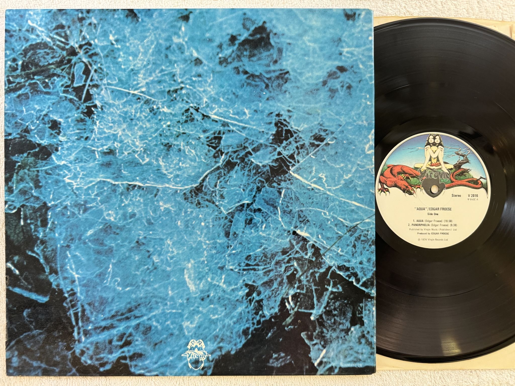 Omslagsbild för skivan EDGAR FROESE aqua LP -74 UK VIRGIN V2016