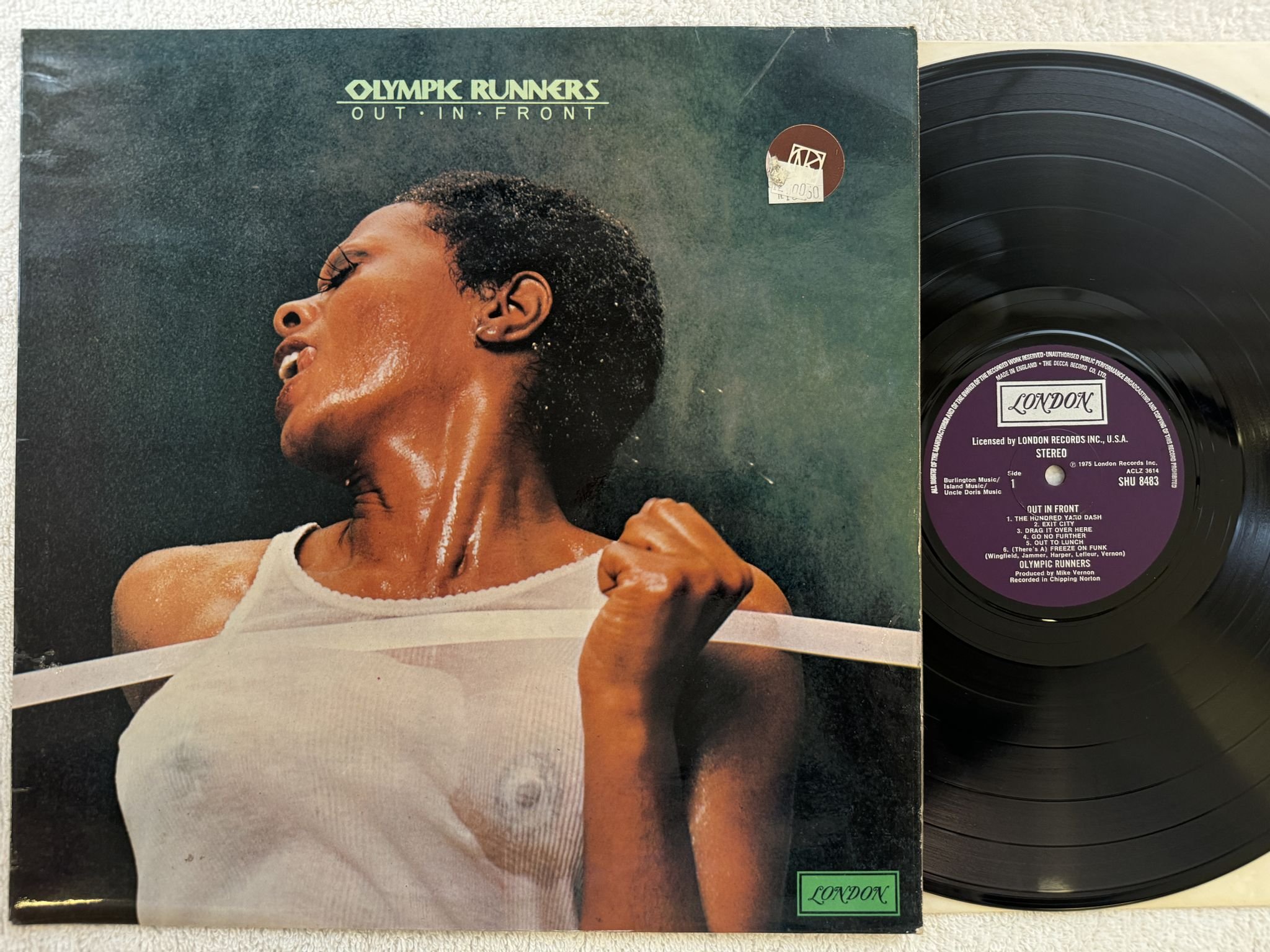 Omslagsbild för skivan OLYMPIC RUNNERS out in front LP -75 UK DECCA SHU 8483