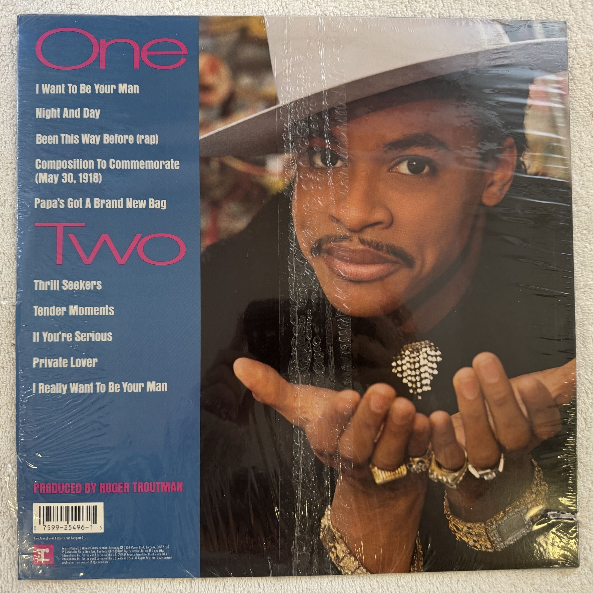 Omslagsbild för skivan ROGER unlimited! LP -87 US REPRISE 9 25496-1 *** STILL SEALED ***