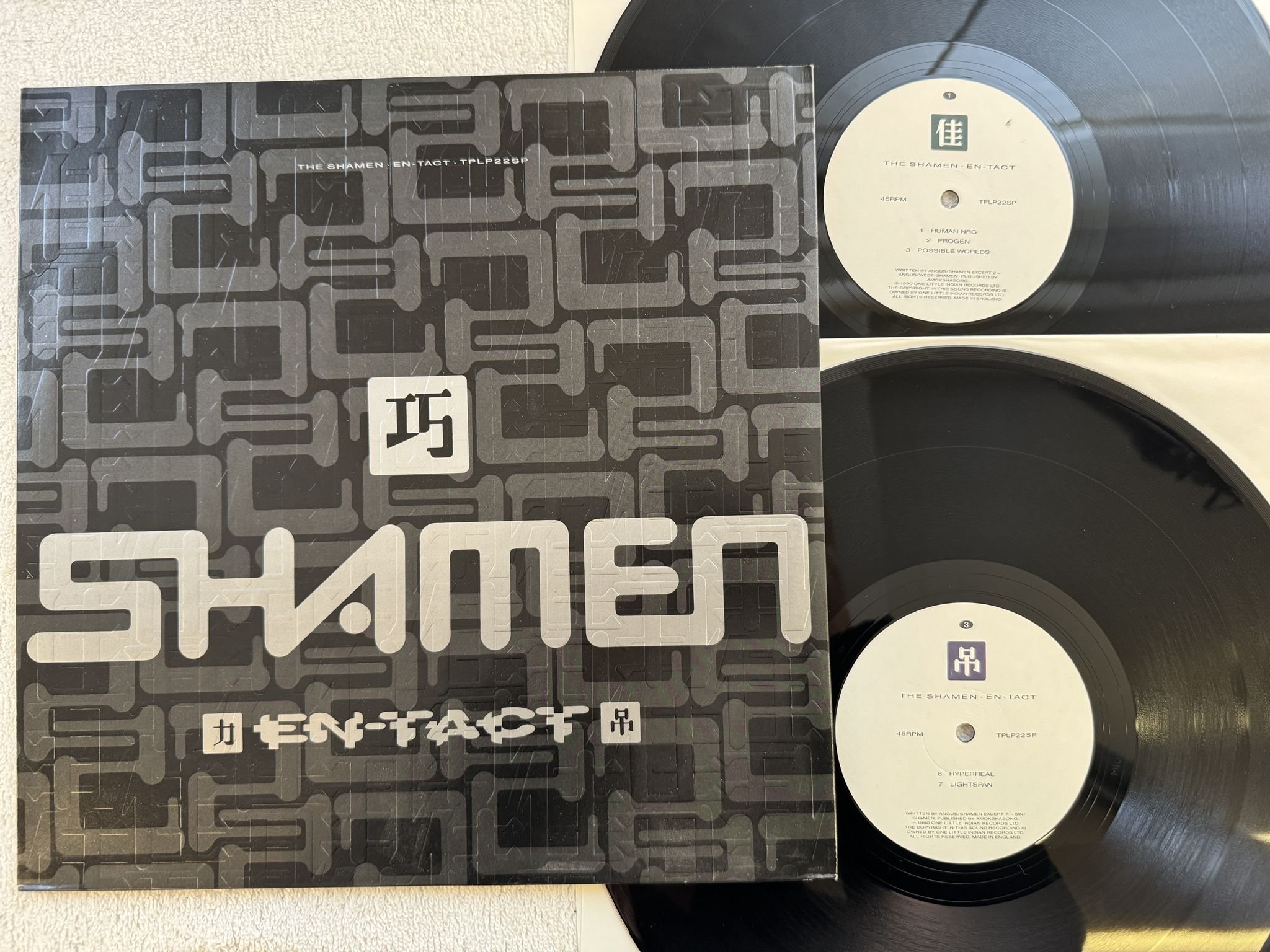 Omslagsbild för skivan SHAMEN En-Tact 2x12" UK -90 ONE LITTLE INDIAN TPLP22SP ** EMBOSSED COVER **