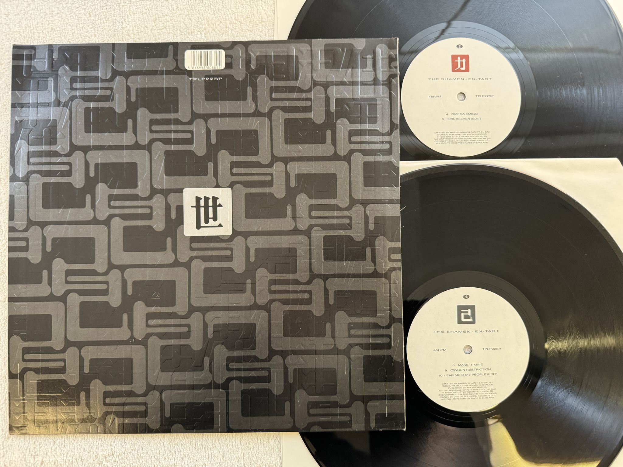Omslagsbild för skivan SHAMEN En-Tact 2x12" UK -90 ONE LITTLE INDIAN TPLP22SP ** EMBOSSED COVER **