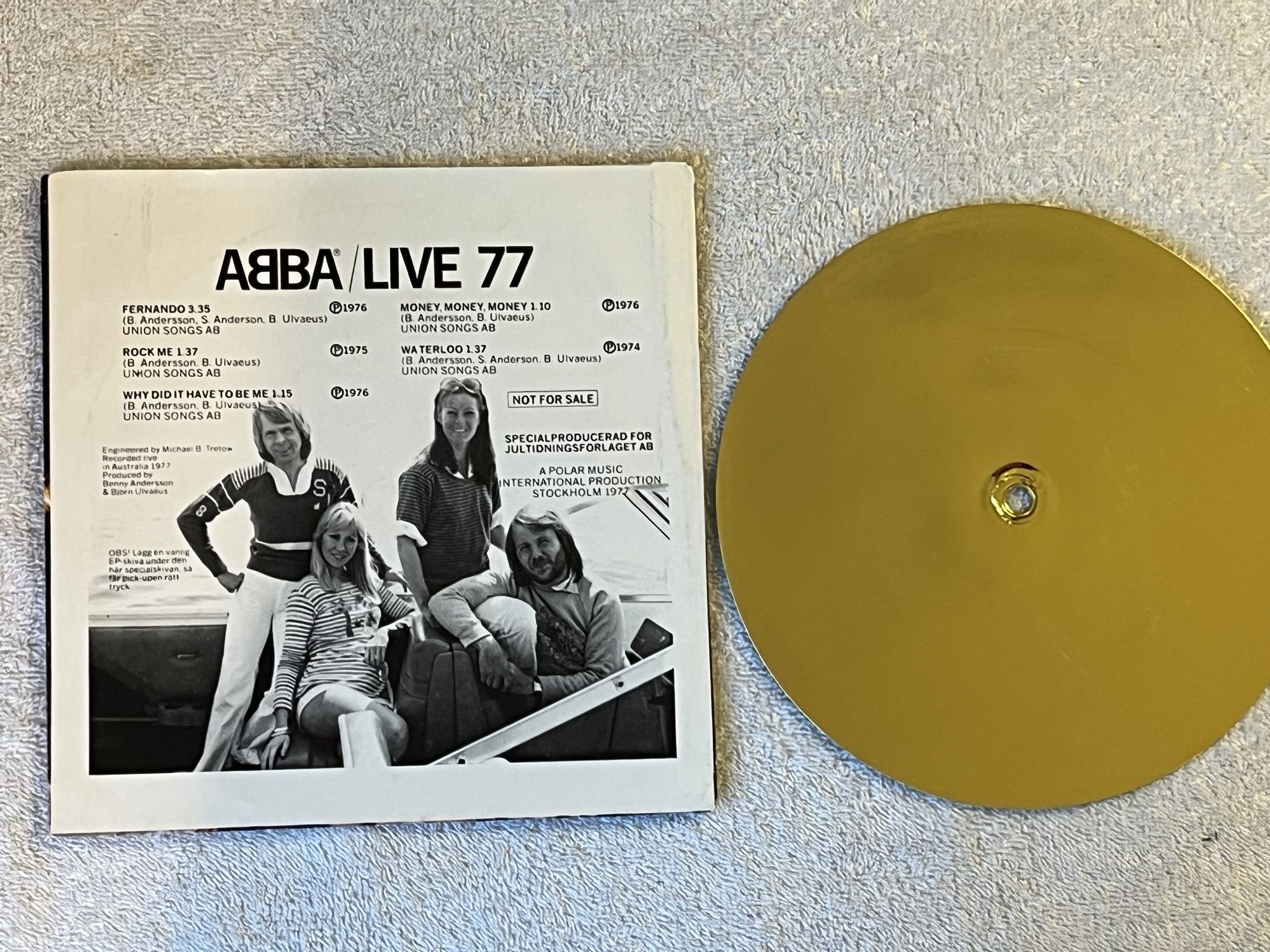 Omslagsbild för skivan ABBA – Live 77 7" (single sided flexi-disc) JULTIDNINGSFÖRLAGET