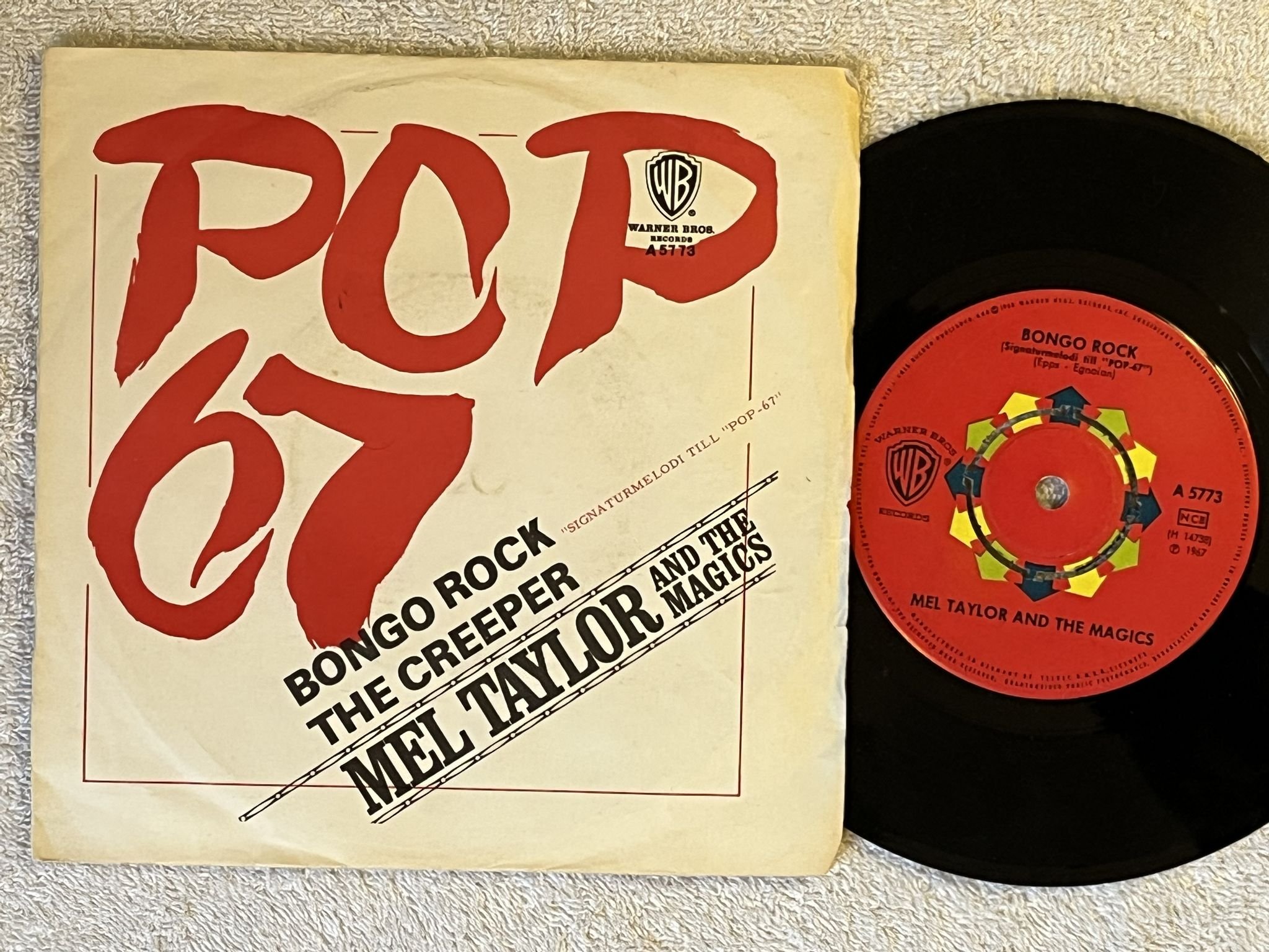 Omslagsbild för skivan MEL TAYLOR AND THE MAGICS bongo rock 7" -67 Swe WARNER BROS A 5773