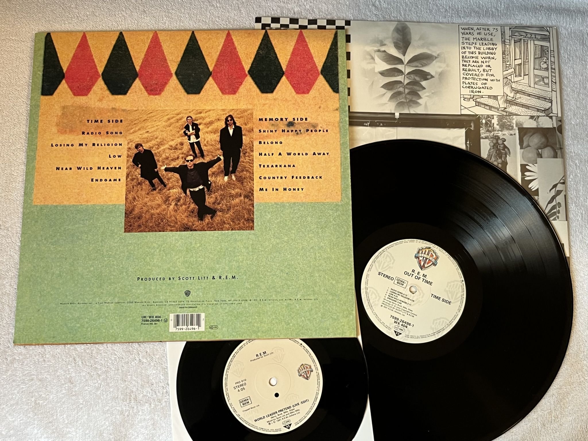 Omslagsbild för skivan R.E.M. out of time LP + 7"single -91 Ger WARNER BROS 7599 26496-1 / PRO 610