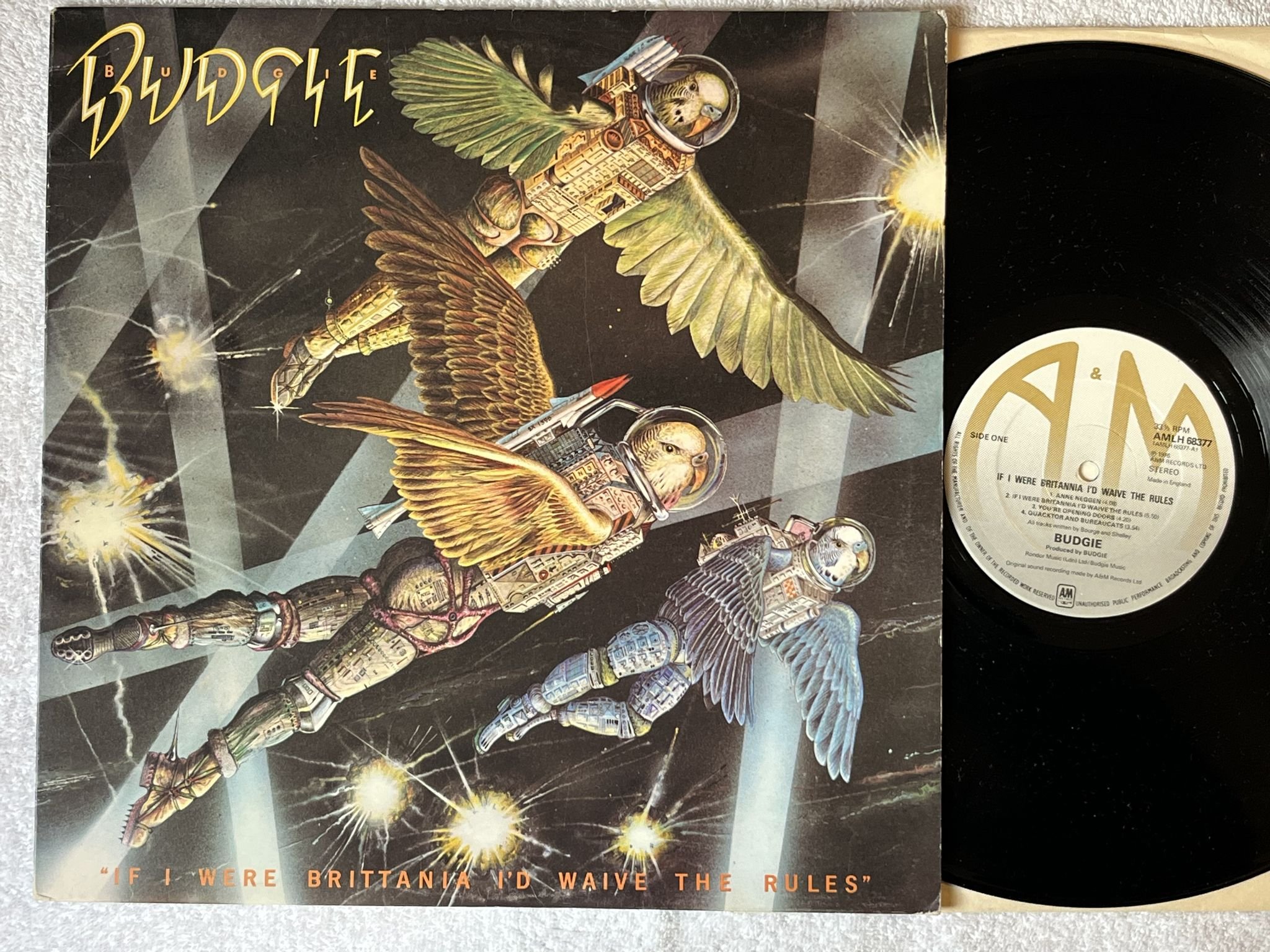 Omslagsbild för skivan BUDGIE if I were Britania I'd waive the rules LP -76 UK A&M AMLH 68377