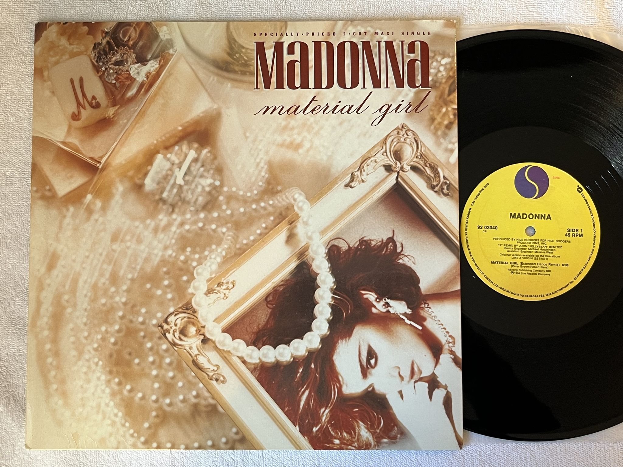 Omslagsbild för skivan MADONNA Material Girl 12" -84 Can SIRE 9203040