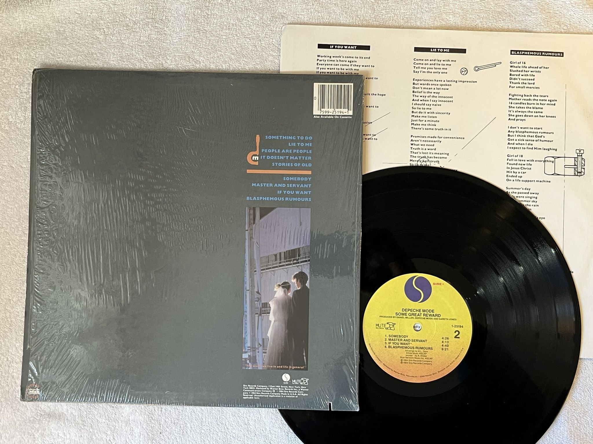 Omslagsbild för skivan DEPECHE MODE Some Great Reward LP -84 US SIRE 1-25194 ** HYPE STICKER **