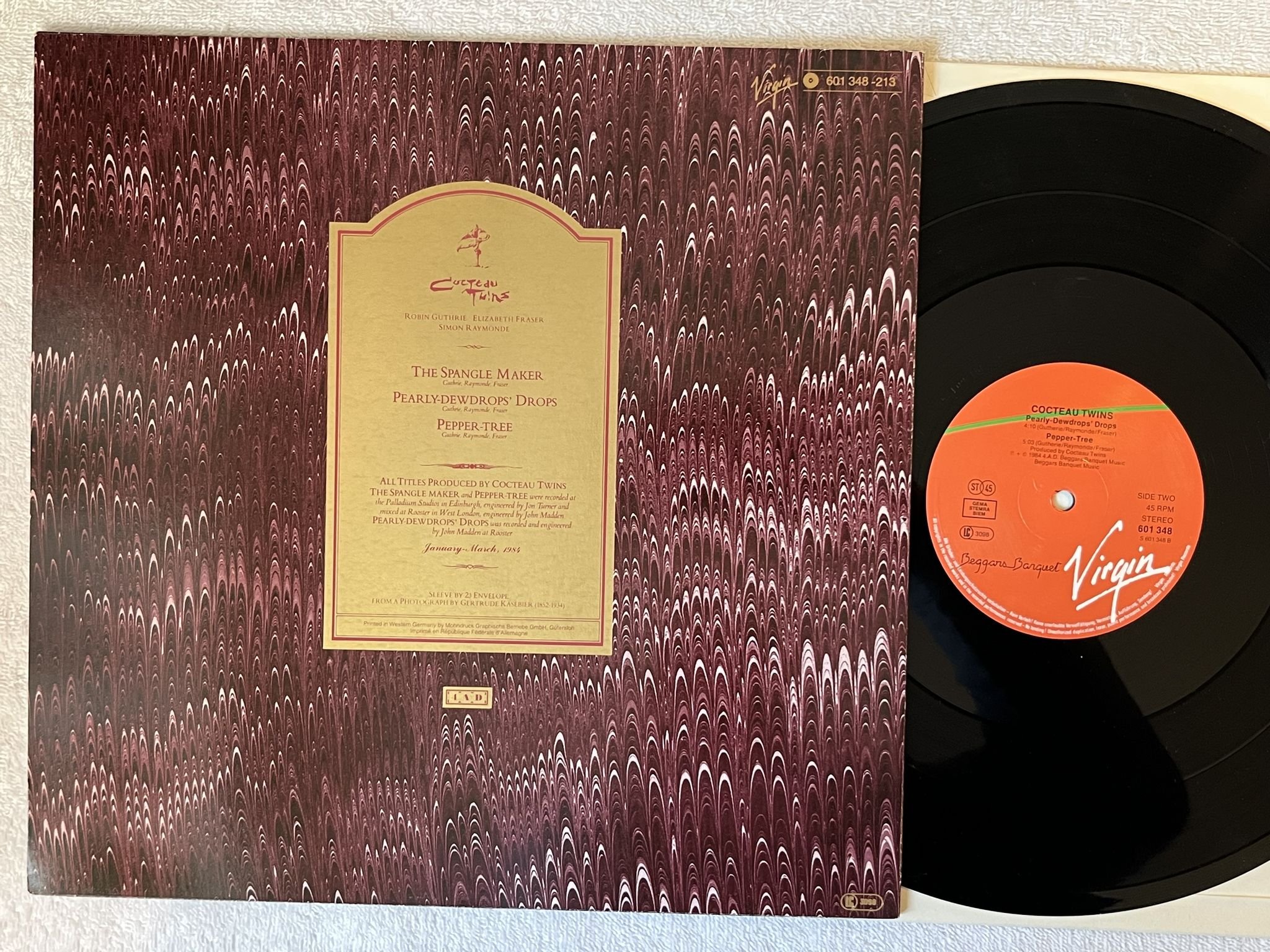 Omslagsbild för skivan COCTEAU TWINS The Spangle Maker 12" -84 VIRGIN 601348213