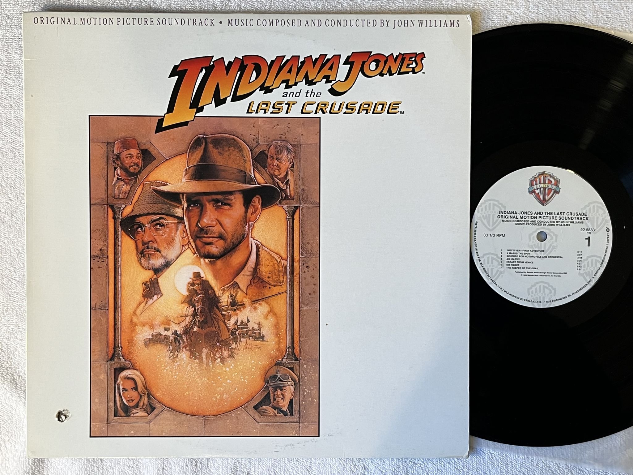 Omslagsbild för skivan JOHN WILLIAMS Indiana Jones & the last crusade LP -89 Can WARNER 92 58831