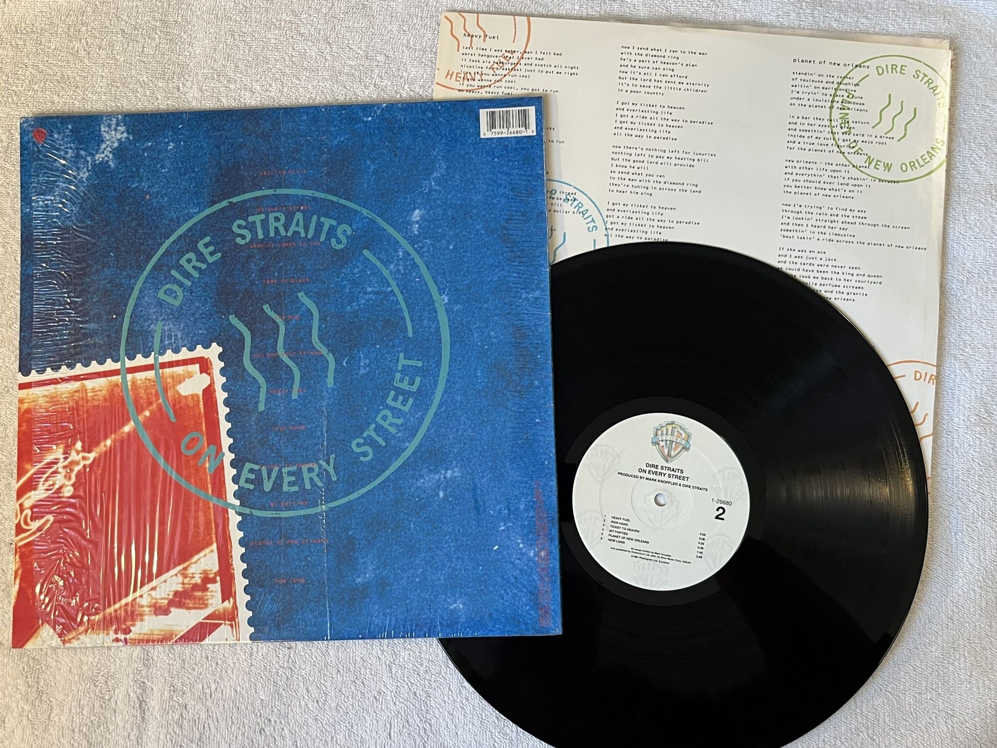 Omslagsbild för skivan DIRE STRAITS On Every Street LP -91 US warner 1-26680 *** Rare US press ***